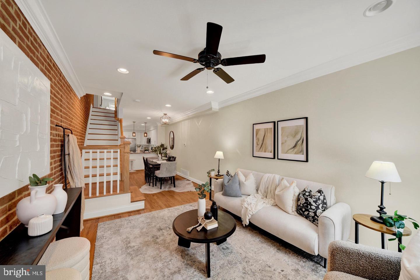 Improved Price! Conveniently located Canton Rowhome, steps to restaurants, bars, and the Harbor; with easy access to I-95 and 83. Completely updated in 2021 by Mason Properties, boasting 4 bedrooms 3.5 baths, beautiful hardwood floors throughout main and second level. Main level offers spacious family room, dining area, kitchen with island seating, and powder room, with rear door leading to parking pad. On the second level, you'll find 2 spacious bedrooms, 1 with en suite bath w/ jetted shower, a hall bathroom, and stackable w/d, with hall door leading to root top deck to enjoy sunsets and 360 views of the city! Lower level is complete with 2 bedrooms, 1 full bathroom. 5 YEAR CHAP REMAINING (buyer to verify)