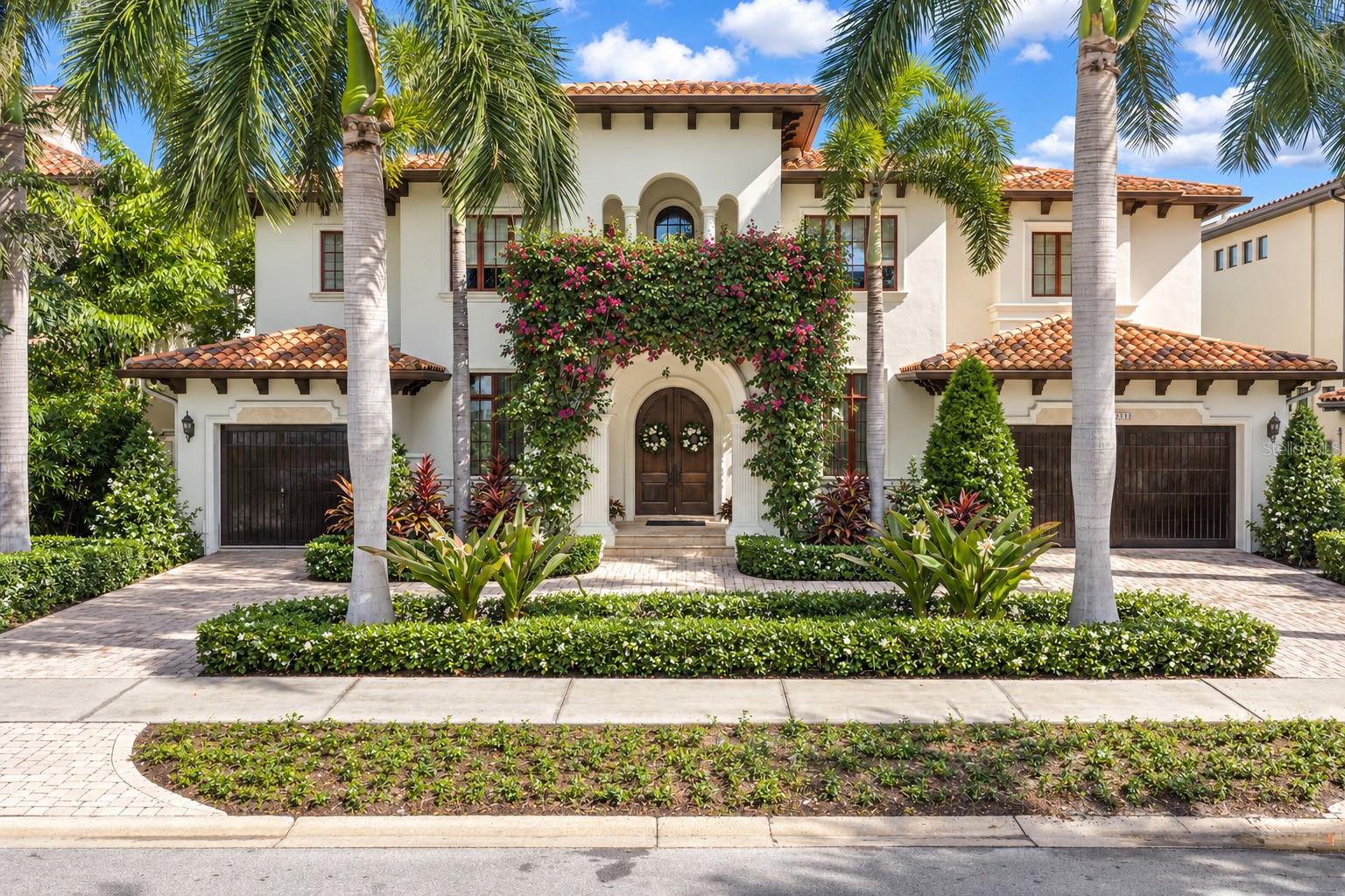 Built by Don Hughes, this waterfront pool home on San Miguel Pointe has bay views and attention to detail with fine finishes. Architectural features include extensive crown moldings, 7-inch baseboards and high ceilings. This Mediterranean estate has lush tropical landscaping, circular driveway and a clay barrel tile roof. Upon entering through the arched double doors, you will see polished Travertine floors throughout the first floor. The formal living room has a gas fireplace and there is a climatized wine room. The gourmet open kitchen has an informal dining area and breakfast bar, center island with a vegetable sink, six burner gas cook-top, double ovens and a walk-in pantry. There is a butler’s pantry off the formal dining room. Completing the first floor is a family room, music room with built-ins and a wet bar, a full bath and a half bath and the sixth bedroom which is used as a gym. The second floor has five bedrooms, two of the bedrooms are ensuite and two bedrooms share a Jack-n-Jill bath. The primary suite has double crown moldings, trey ceiling, sitting area, two walk-in closets and a private balcony with stunning bay views. The primary bath has double vanities, jetted tub and a large walk-in shower with a rain head. Completing this home is a breathtaking outdoor oasis. It has a pool and spa that overlook the water, covered private dock with boat lift and two jet ski lifts, outdoor kitchen and fire pit. This home is elevated and has not had any water intrusion. Seller financing is available.
