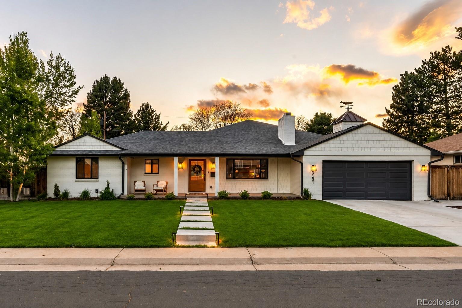 Every inch of this home has been reimagined from the ground up by renowned high-end custom home builder, KZ Smith. Turnkey,  luxury living on a quiet street in one of Denver's most sought after neighborhoods. Ideally located near Slavens K-8, this home offers a seamless blend of timeless charm and modern sophistication.From the custom Carrara marble fireplace surround to the hand-sourced teak door from Bali, this is a home with character and an obsessive attention to detail. The main level offers a functional and inviting layout with three bedrooms, three bathrooms, spacious living and dining areas and a dedicated office space. Large slider doors open to a patio, creating seamless indoor-outdoor living. The heart of the home is the thoughtfully appointed kitchen. Complete with an oversized island, top of the line appliances with the Wolf dual fuel six-burner range, Bosch dishwasher and french door refrigerator, matte quartz countertops, and abundant storage. The primary suite is a true retreat boasting nearly 600 square feet of dedicated space, a custom walk-in closet, a spa-inspired five-piece bath, dual vanities, a soaking tub, oversized shower, and private water closet. Two additional bedrooms and a bathroom flank the other side of the home.A large front office easily accommodates a work from home lifestyle with custom built-in cabinetry shelving and a gas fireplace.The home is  equipped with a Savant entertainment system, camera and alarm security system. Motorized blinds are woven throughout for true smart home living.Additional highlights include hardwood floors throughout, a laundry room equipped with Electrolux washer / dryer units, a large two-car garage and a newly finished basement offering a conforming bedroom, full bathroom and versatile flex space — perfect for a gym or media room.Outside, brand new landscaping and irrigation were installed for low maintenance living. Make your showing today!
