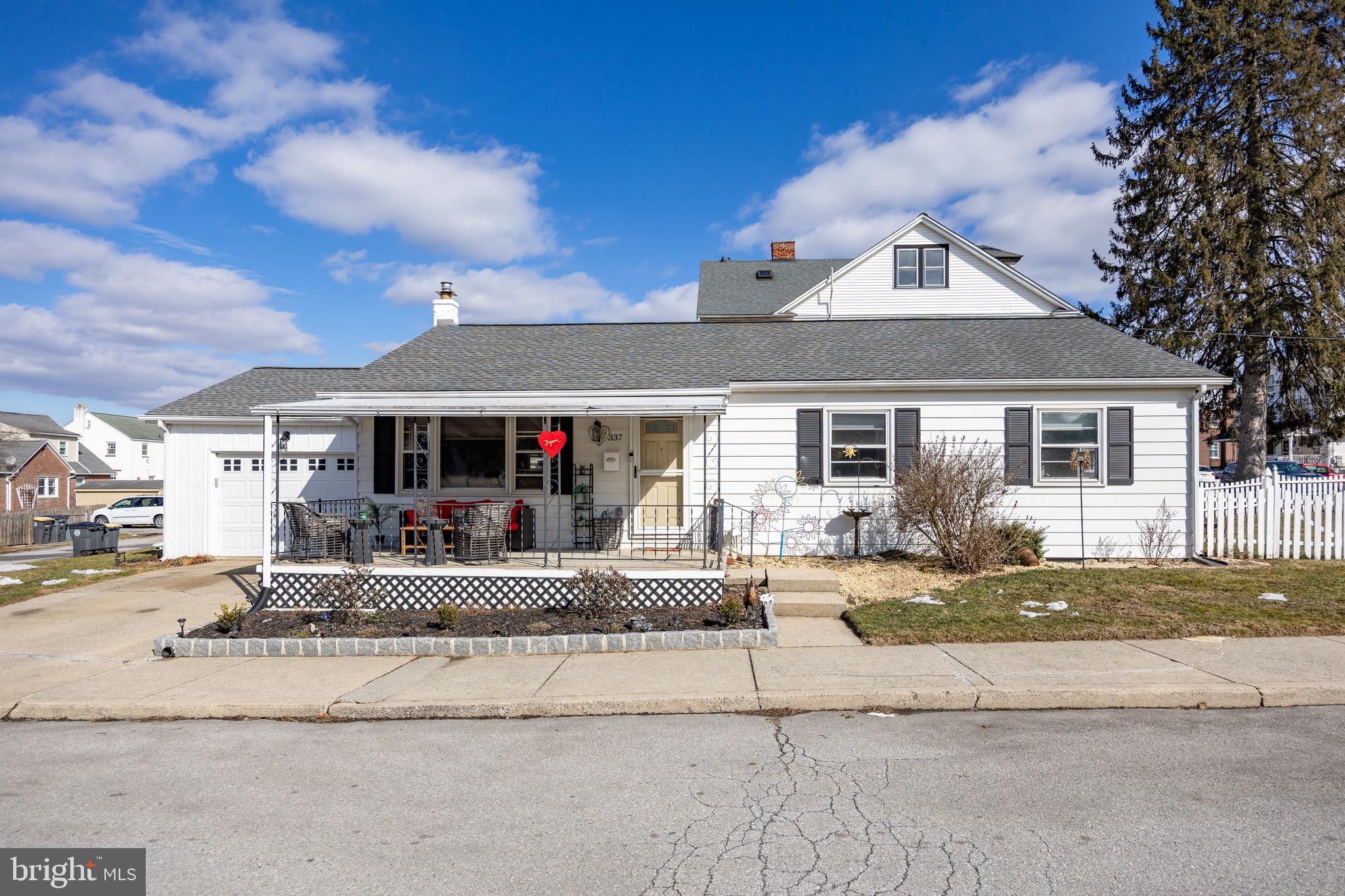 Turnkey and ready for you in the heart of Downingtown borough.  This beautifully maintained 3 bed, 2 bath  ranch style home offers one story living with the  perfect blend of comfort, convenience, and peace of mind. Ideally located on a fully fenced corner lot in  Downingtown School District,  you can walk to local parks, restaurants, scenic  walking trails, and the train station—making it easy to enjoy everything the community has to offer.  Relax with your morning coffee on the covered front porch or entertain guests on the rear patio this summer.  Inside, the sun-filled living room features a large picture window and an open flow into the dining area.  The kitchen is equipped with gas cooking, newer appliances, and full ceiling-height cabinetry, offering both style and functionality.  Hardwood floors run throughout the home, and all three bedrooms are generously sized with ample closet space.  There  are two full baths- one in the hallway and one in the primary bedroom. Major improvements have already been completed for you, including a newer roof with a 50-year transferrable warranty,  new HVAC system with the addition of central air, fresh interior paint, and a full waterproofing system with a French drain and two sump pumps.  For added security and convenience, a full-house generator is included and transfers with the property.  Additional features include economical gas heat, a full basement offering excellent storage or finishing potential, and an oversized one-car garage.  A one year home warranty is included with purchase.