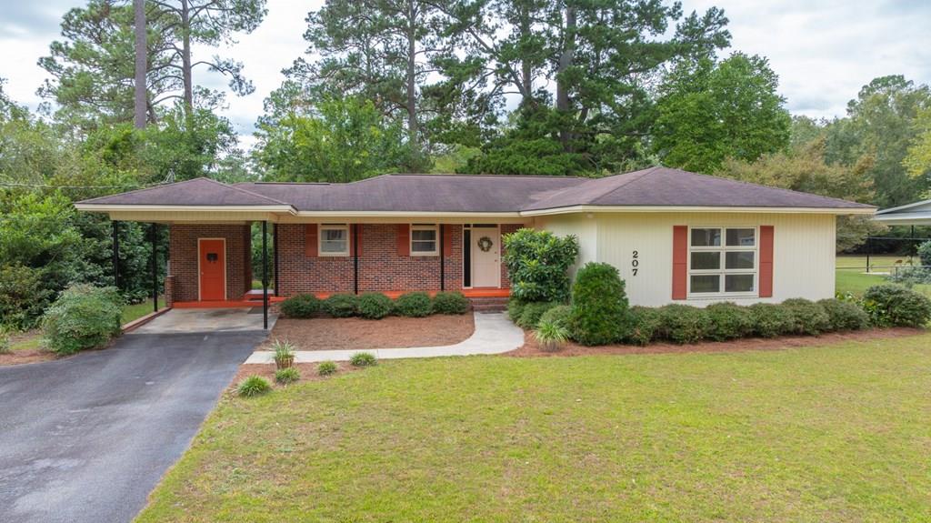 You can't get a better location than this 3/2.5 in Thomasville with a Generac whole home generator! You are three minutes from both the city and county middle/high schools, a golf-cart ride from shops and restaurants in downtown Thomasville, and walking distance to MacIntyre park. Imagine sipping your morning coffee while gazing into your private back yard through the large sliding glass doors. At 1,773 Sq Ft, there is plenty of room to spread out! The kitchen is well-equipped and ready for your personal touch. The asphalt driveway and one-car carport keep your feet clean, and your head dry! Come check out this house today!