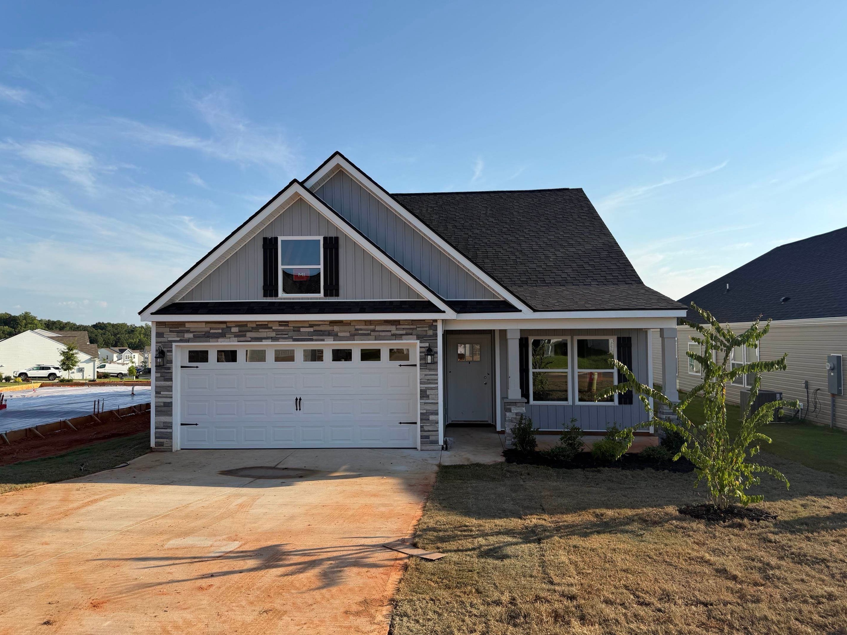 The BISHOP plan with Flex room upstairs (Lot 167). Open living area and study. Granite countertops, crown molding with rope lighting, and many more features included. Double vanity.  12' X 12' Covered patio with upgraded 10x12 patio adjacent.  Flex room acts as 4th bedroom! 30-year architectural shingles, site-built construction, and a 10 year limited warranty are included to give you peace of mind.  Closing cost or upgrades incentives available when working with a preferred lender and attorney!!   *Virtual tour reflects same house plan, not exact house.