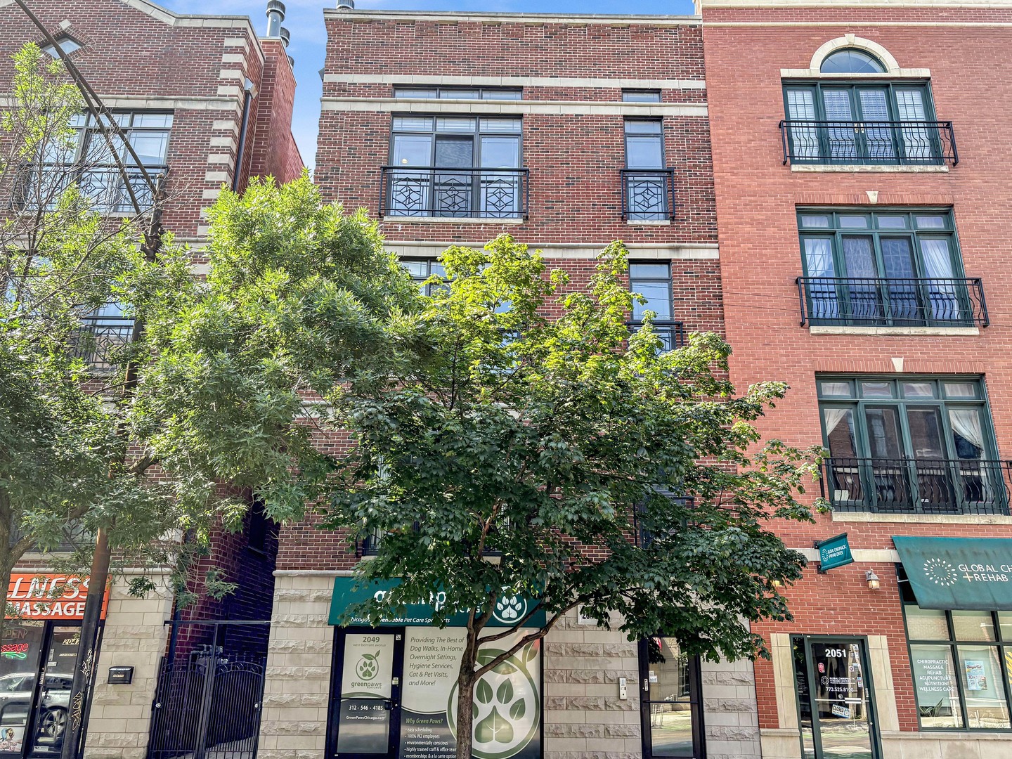 Welcome home to the heart of Roscoe Village! You won't want to miss this stunning 3 bed 2 bath penthouse in one of Chicago's most beloved neighborhoods. From the moment you step inside, you'll be greeted by floor-to-ceiling windows that flood the space with natural light and highlight the soaring ceilings, elegant crown molding, detailed hardwood floors, and cozy fireplace.    The expansive living room easily accommodates a large sectional with plenty of room to spare. It seamlessly flows into the oversized chef's kitchen, which is truly the heart of the home. Perfectly designed for both everyday living and entertaining, the kitchen features crisp white cabinetry, stainless steel appliances (including a nearly new double oven), a generous island, and more storage than you'll know what to do with! Just off the kitchen, a designated dining area is situated next to a custom built-in bar with beverage fridge -- an entertainer's dream.    Down the hall, you'll find two spacious guest bedrooms, including one that's currently used as both a home office and gym. The guest bathroom has been tastefully updated with stylish finishes, including matte black hardware, a wood vanity with a sleek white countertop, and marble-tiled shower/tub combo.    At the rear of the unit, the serene primary suite feels like a true retreat, quietly tucked away from the main living areas. You'll love the walk-in closet and completely renovated ensuite bath, featuring a double vanity, walk-in glass shower, designer tilework, and chic fixtures. From the primary bedroom, step outside to a roomy south-facing deck, perfect for morning coffee, grilling, or small gatherings. You can also access the deck from the spacious walk-in laundry room, complete with side-by-side washer and dryer!    Garage parking and a dedicated storage unit are included, along with private roof rights offering amazing build-out potential. Located just steps from Roscoe Village's best shops, restaurants, parks, and more, this is a home that truly checks every box. The current owners have absolutely loved living here, and it's easy to see why!
