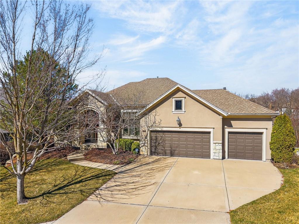 Discover this remarkable reverse 1.5-story home in the highly sought-after Riss Lake community—where luxury, comfort, and natural beauty come together.The inviting open floor plan is designed for both everyday living and effortless entertaining. The spacious kitchen features a gas cooktop, double ovens, granite countertops, and abundant cabinetry, flowing seamlessly into the great room with stunning floor-to-ceiling windows overlooking the park-like backyard and surrounding wildlife. A cozy hearth room with a gas fireplace, an inviting eat-in area, and a private formal dining room provide the perfect blend of warmth, function, and elegance for any occasion.Enjoy exceptional landscaping and a private backyard retreat ideal for relaxing or hosting guests.A striking circular staircase leads to the walk-out lower level featuring a spacious family room, three bedrooms, and two full baths. A beautifully appointed kitchenette complete with refrigerator, sink, and granite counters makes the space perfect for guests, entertaining, or multi-generational living.This is a home you don’t want to miss—call for a private showing!