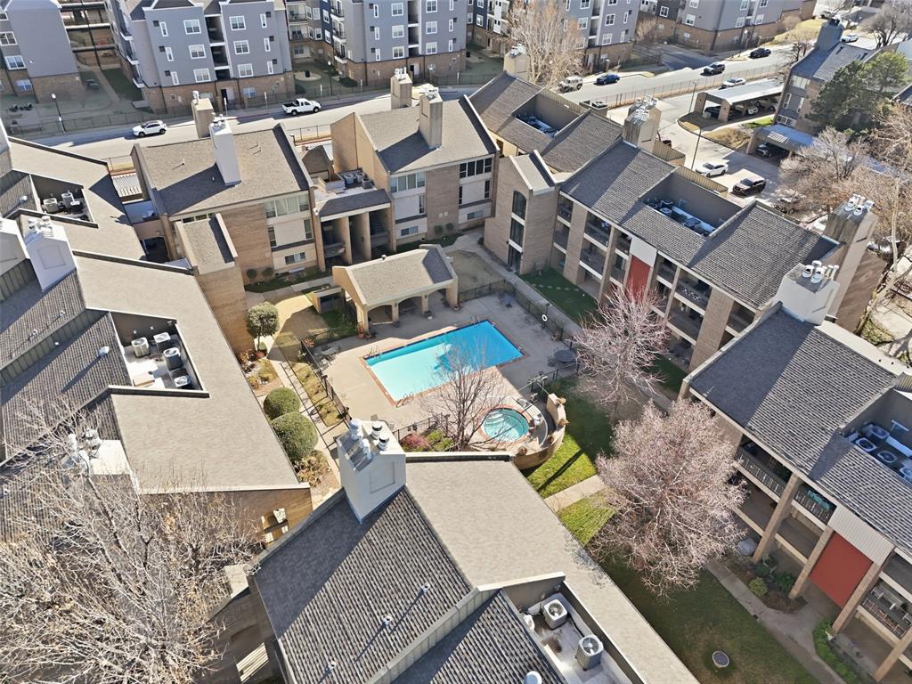 LOCATION, LOCATION! This FULLY RENOVATED condo is in the heart of downtown OKC. Just a short walk to Myriad Gardens, Devon tower and so much more! This area is booming. You will love the security of this double gated condo, the parking lot is gated, and the building itself is gated with lovely courtyards, swimming pool and hot tub. This unit is on the lower level and has wood-look tile in the living, Kitchens, and bathrooms. The Bedrooms both have brand new carpet as well. The Kitchen has lovely cabinetry with pull-outs in the lower cabinets and granite countertops! Not to mention the home comes with the refrigerator, and washer and dryer, truly move in ready. Both bathrooms have updated cabinets, tubs, shower tile, mirrors and granite counters. The Heat and Air was even replaced in 2018 and there is 2 storage closets across from the unit that belong to it. Don't miss your opportunity to live downtown! BUYER TO VERIFY SCHOOL DISTRICT