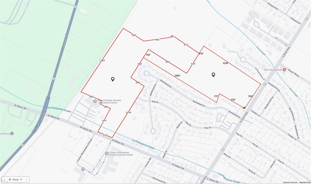 Developed vacant land: Sewer, Water, electrical established. Listing sold under two parcel IDs: 12-010-354-00 and 12-368-000. Parcels are ~54 acres.