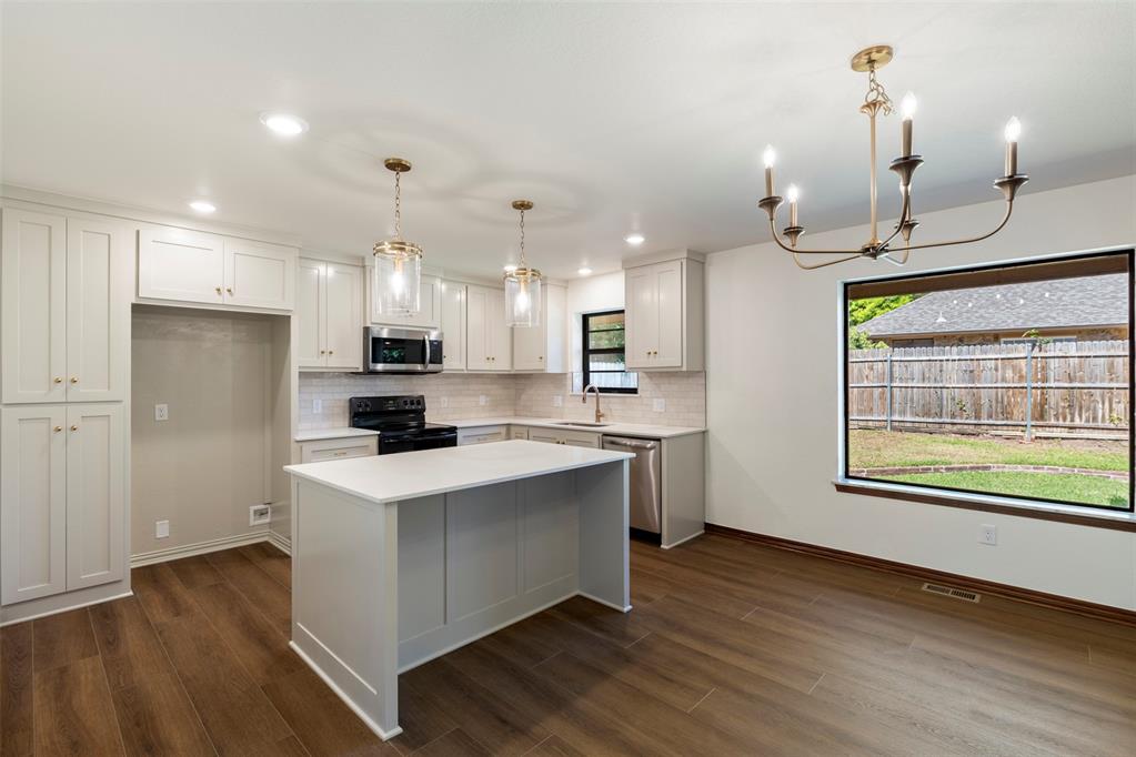 Welcome to this fully remodeled gem in the desirable Forest Oaks neighborhood. This spacious home offers a wide open-concept floor plan filled with natural light and beautiful updates throughout. Step into the inviting living area featuring a stunning stone fireplace, a full wall of built-in cabinetry, and large windows that brighten the space. The kitchen has been completely updated with new cabinetry, hardware, appliances, and upgraded lighting—perfect for cooking and entertaining. Each bedroom is generously sized and includes double closets, providing ample storage for all your needs. The hall bath includes a shower and tub combination with plenty of cabinetry and counter space. The primary suite features a dual vanity, relaxing soaker tub, and a brand-new toilet. Both bathrooms have been tastefully updated to blend comfort and function. This home offers an incredible opportunity to enjoy a modern lifestyle with established charm, all within close proximity to Edmond’s shopping, dining, and top-rated schools. Come experience everything this beautiful home has to offer!