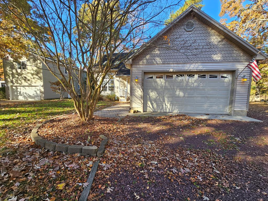 This stunning 3 bed, 2.5 bath house is an exceptional property with a perfect blend of comfort and luxury living in a prime waterfront location.The home features impressive high ceilings throughout, creating an airy and spacious atmosphere that enhances every room. A thoughtfully designed eat-in kitchen that flows seamlessly into the living areas, perfect for both daily meals and entertaining guests. The open floor plan maximizes the natural light &creates an inviting environment for family gatherings. Step outside to discover your private oasis with multiple outdoor living spaces. Enjoy the  screened porch ,open deck, or venture down the hardscape to your private outdoor tiki bar overlooking the pond. Abundant with wildlife, this is surely one you dont want want to miss.