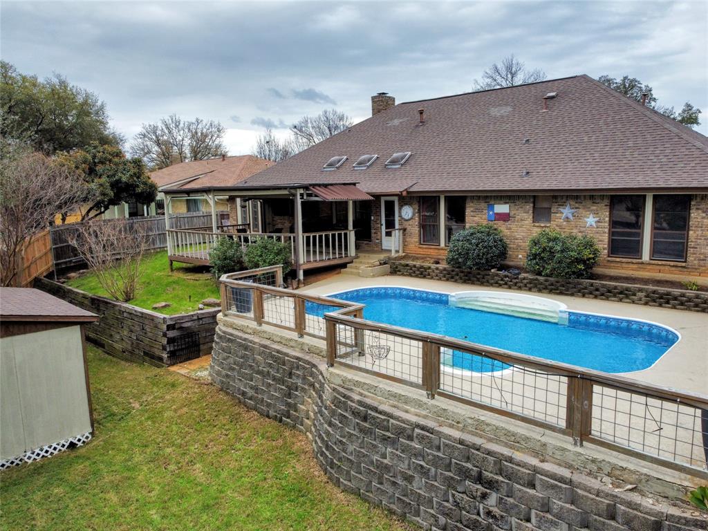 You will LOVE this fantastic single story home in the Huntwick addition of Arlington in the highly desired Martin High school attendance zone AND with an in ground swimming pool-just in time for summer!!! Enjoy updates including wood flooring, leathered granite countertops, stainless gas cooktop-microwave and dishwasher, updated lighting, updated HVAC system-custom painted cabinets-AND MORE!!! Extra large split master living suite boasts a custom walk-in shower and 2 walk-in closets!!! A HUGE mother-in-law suite on the opposite side of the house is great for multigenerational families!!! Enjoy entertaining your guests in your backyard oasis on your large covered deck overlooking your sparkling swimming pool!!! Large shed is great for extra storage or working on projects. Great location just minutes to major shopping areas, restaurants, and Interstate 20!!!