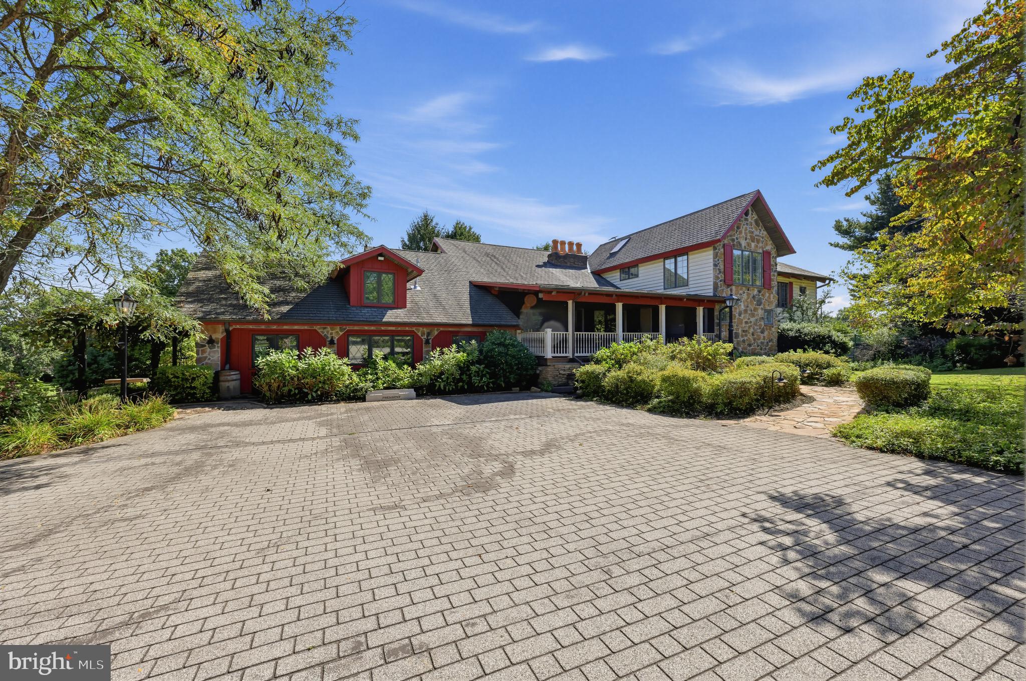 Tucked away at the end of a private lane on 4 breathtaking acres in prestigious Glen Mills, this one-of-a-kind estate offers an unparalleled combination of luxury, recreation, and versatility. The main residence features 6 bedrooms, 5 full baths, 2 kitchens, multiple spacious living and gathering areas, and expansive decks overlooking the resort-style grounds.Outdoor living is truly exceptional, centered around a stunning in-ground pool and an impressive pool house complete with a full bath and sauna, creating the perfect setting for entertaining or private relaxation. Sports enthusiasts will appreciate the multi-purpose court designed for tennis, pickleball, and basketball, while golf lovers can enjoy their very own private par-3 hole right on the property.The estate also includes a separate entertainment lodge featuring an additional bedroom, full bath, media room, two bars, and a full kitchen, making it ideal for guests, extended family, or unforgettable gatherings. A detached four-car garage offers abundant storage and is topped by a substantial office suite complete with its own full bath, providing an exceptional work-from-home environment or additional flexible space.Offering remarkable privacy, endless amenities, and a setting unlike anything else on the market, this extraordinary Glen Mills compound presents a rare opportunity to own a true destination property just minutes from shopping, dining, major roadways, and award-winning schools.