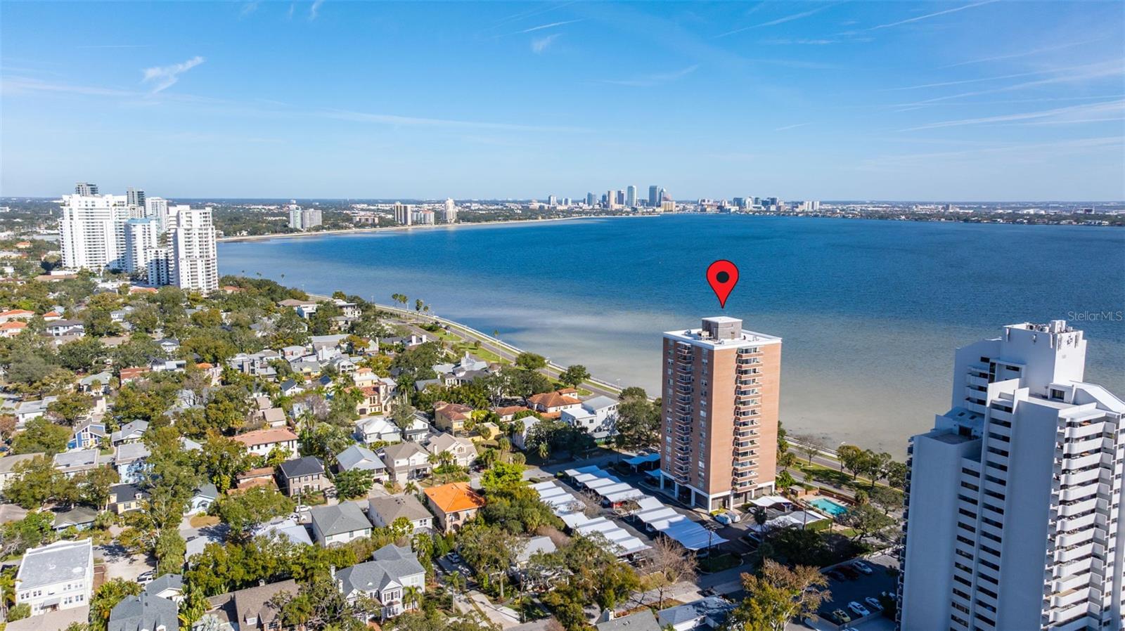 Experience elevated living on iconic Bayshore Boulevard in this beautifully updated, rarely available waterfront 1 bed/1 bath condo. Enjoy scenic views of Bayshore and South Tampa from this 10th floor move-in ready residence which features engineered hardwood flooring, an updated kitchen and bathroom, and impact-resistant windows. Step out onto your balcony and take in the lovely bay, treetop and city views - perfect for morning coffee or evening sunsets. This unit includes an assigned covered carport and private storage unit. The well-maintained community offers desirable amenities such as a pool, guest suite for visitors, onsite management, maintenance staff, and ample guest parking. Ideally located in Bayshore Beautiful, one of South Tampa's most desirable neighborhoods you are minutes away from Downtown, Hyde Park Village and Ballast Point. The best dining and shopping are nearby. This tastefully updated residence offers the perfect blend of modernity, convenience, and waterfront lifestyle. This building has already completed and passed its mandatory Milestone Inspection and has a brand new roof!