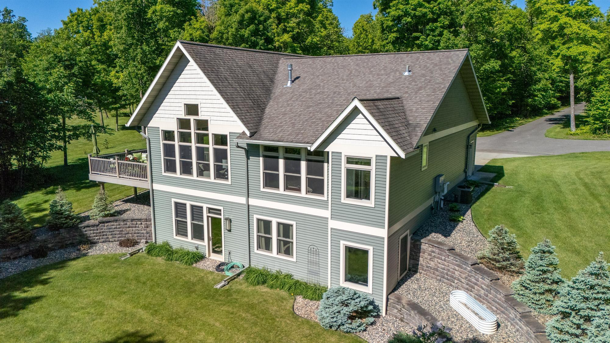 Welcome to year-round lake living on beautiful Buck Lake! Buck Lake is part of the sought after Cass Lake chain of lakes. This spectacular one owner quality-built home was designed to enjoy the lake views and the oversized windows and doors provide sunrise views and natural light throughout the day. This 2 level, walk out lower level home features high quality custom finishes and materials throughout. The main level includes a gourmet kitchen/dining area, spacious living room with vaulted ceilings with lake views, distinguished den, handy office, and an elegant primary suite with a lake view and custom finishes throughout the full bathroom.  Lower level includes a fun getaway living area/entertaining space, a bathroom, 2 bedrooms, laundry room, storage room, and a utility room. Completing this distinguished home is a deck off the living room to enjoy outdoor living, an attached 2 stall heated garage, and a path from the walkout area to a 2 stall covered floating dock.
Other Realtor notes: Buck Lake is centrally located among the 8 lakes the make up the Cass Lake Chain of Lakes and is located in the heart of the Chippewa National Forest.
The chain also offers beautiful scenery with forested shorelines and sandy beaches.
Make sure to visit Star Island and unique Lake Windigo by boat!