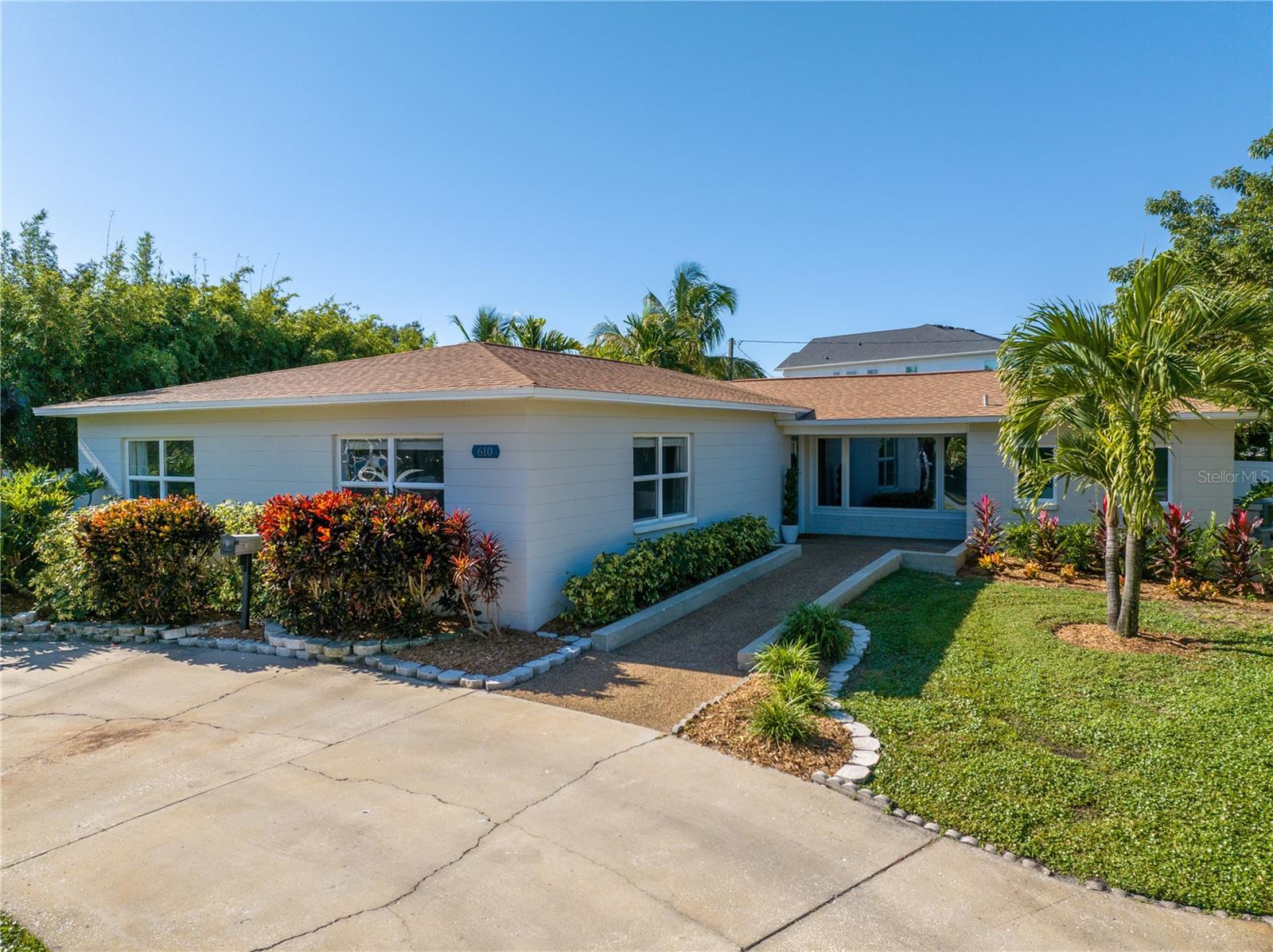 Welcome to a Snell Isle home that did not flood! One of the most desirable neighborhoods in Saint Petersburg. This 4 bedroom, 3 bath pool home is move in ready. The roof is 9 years young and the central AC is only 2 years old. The permitted addition of the 4th bedroom, 3rd bathroom and inside laundry was completed in 2022. A new electric panel was installed at the same time. Insulated windows are installed throughout the home. The hot water is supplied by a tankless electric water heater. The home has a seperate room feel in the main living area while maintaining an open floor plan design. The living room, dining room, foyer entry and pool area all hub off of the kitchen. The screened in pool area has plenty of room to entertain while under cover or not. The vinyl fenced backyard is oversized with room for a storage room and boat or camper parking if desired. Off course living on Snell Isle you could use a golf cart to get around and there is parking for one on the south side of the home. One of the benefits to this area is its close proximity to St. Pete's vibrant downtown and expansive waterfront parks. It's time to make the move!
