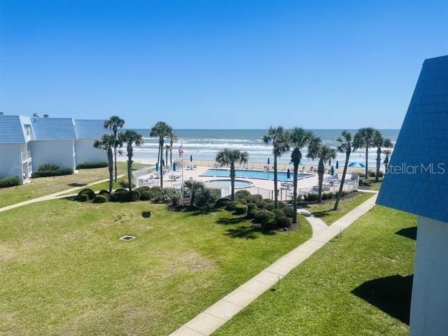 Wake up to breathtaking Atlantic Ocean views in this beautifully renovated, fully furnished, move-in ready 2-bedroom, 2-bathroom condo at the highly desirable Crescent Sandpiper! Perfectly positioned along the shores of Crescent Beach, this oceanfront community offers incredible water views and direct beach access, making everyday living feel like a vacation.Step inside this thoughtfully updated coastal retreat featuring beautiful luxury vinyl plank flooring throughout, charming decorative ceiling details, and a bright, inviting living space that opens to your private covered balcony overlooking the Atlantic Ocean.The kitchen features white shaker-style cabinetry, quartz countertops, stainless steel appliances, and a stylish tile backsplash.Upstairs, the spacious primary bedroom offers stunning ocean views, while the guest bedroom enjoys lovely Intracoastal views. An in-unit washer and dryer adds everyday convenience, a feature not commonly found in this community. Additional improvements include a complete re-pipe, an A/C replacement in 2022, an upgraded impact-rated sliding glass door, electric storm shutters, and a water heater replaced in 2018.Crescent Sandpiper offers a wonderful collection of community amenities, including private beach access, a swimming pool, tennis courts, a grilling area, bicycle storage, and a community sundeck where you can take in beautiful Intracoastal sunsets.Whether you're looking for a full-time coastal residence, a relaxing beach getaway, or an investment opportunity, this beautifully furnished condo is ready for you to start enjoying the beach lifestyle from day one. Just bring your suitcase and settle in!