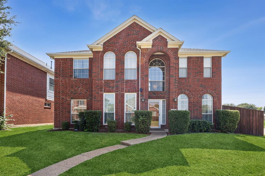 LOCATION, LOCATION, LOCATION! This beautifully maintained 2-story, 4-bedroom, 3-bath home sits on a prime corner lot just minutes from Grandscape, Legacy West, and Stonebriar Mall. A soaring entry with high ceilings and a striking overlook staircase sets the tone for the open, elegant layout.

The first floor offers an office with glass French doors, formal and casual dining, a secondary bedroom with full bath, utility room, and a cozy living room with a fireplace. Upstairs features a spacious primary suite with built-ins and an additional fireplace. The master bath boasts a deep soaking garden tub with a separate shower, dual sinks and a walk-in closet. Two additional bedrooms, a full bath and a large game room complete the second floor.

Enjoy the outdoors with an oversized covered patio, 6-ft board-on-board fence, and plenty of privacy for outdoor activities. Conveniently located near shopping, dining, and multiple entertainment districts—your new home awaits!