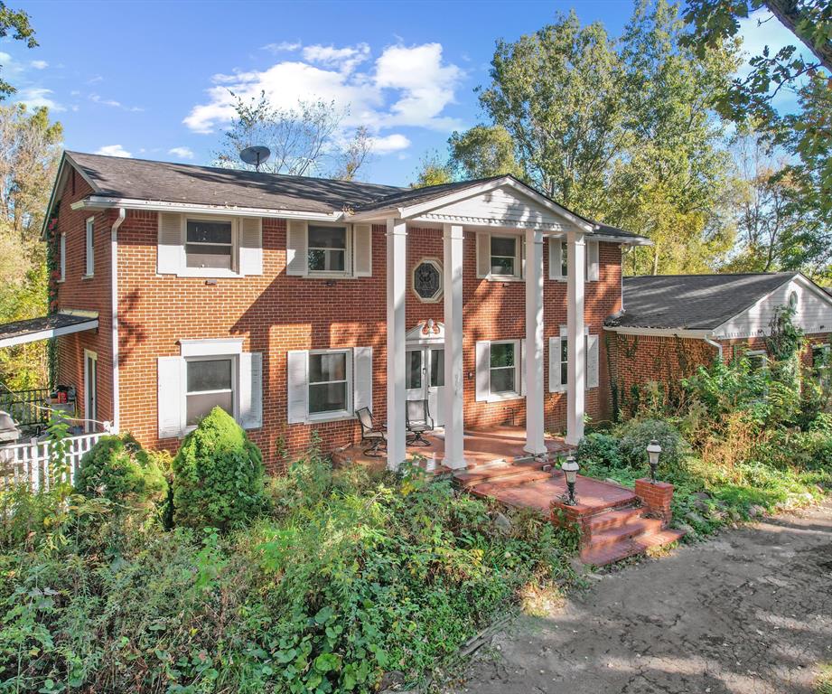 The BENEFIT of this property...The BENEFIT of this HOUSE on 9.54 Acres of beautiful land located in NOVI with NORTHVILLE SCHOOLS and NORTHVILLE mailing.  2,800 square foot colonial home with 5 bedrooms / 4 full baths / 3 car attached garage / 1 bedroom, walkout basement, apartment with full kitchen and bath and inground pool.  In 2020, the inground pool, windows, doors and roof were all upgraded and/or replaced, brand new heating and cooling systems installed.  Two additional detached garages. Five-stall horse barn with two fenced pastures.  Mobile storage unit.  Large board walk providing an elevated view of the pond and wooded land. NEED A CONTRACTOR?  Set an appointment to talk with a local premiere builder / sales team for a free consultation. Approximately 40% Wooded.  Approximately 15% Pond/Wetland.  Paved Road Access.  Sidewalk / Bike Path connects the lot/development to a large network of community trails throughout Novi, Northville and Maybury State Park (across the street).  NO HOA.  The property is zoned Residential Acreage leaving many possibilities for DEVELOP, land splits and other uses per city zoning ordinances.  In this area, ONE-ACRE lots sell from $450,000 to over $600,000 and hence you see the opportunity before you as this property is priced below $126,000 per acre.  YOU WILL NOT FIND A DEAL like this on the market now or anytime in the future.  When opportunity knocks - Answer!  City Water at street, City Sewer possible, Natural Gas at street, Electric Connected, Cable / High Speed Internet / Phone - all available.  Current residential structure is on Well and Septic. Convenient to Maybury Park, Hines Park, Downtown Northville, NOVI community amenities, and so much more.  Paved road access to major freeways: I-96, I-275 & M-14 for easy commuting to DTW, Detroit, Dearborn, Ann Arbor and all points far and near.  Just minutes from everything you need including shopping, community services, restaurants, parks, churches, schools, trails and so-on.  ARE YOU LOOKING FOR A LARGE LOT  to split and s