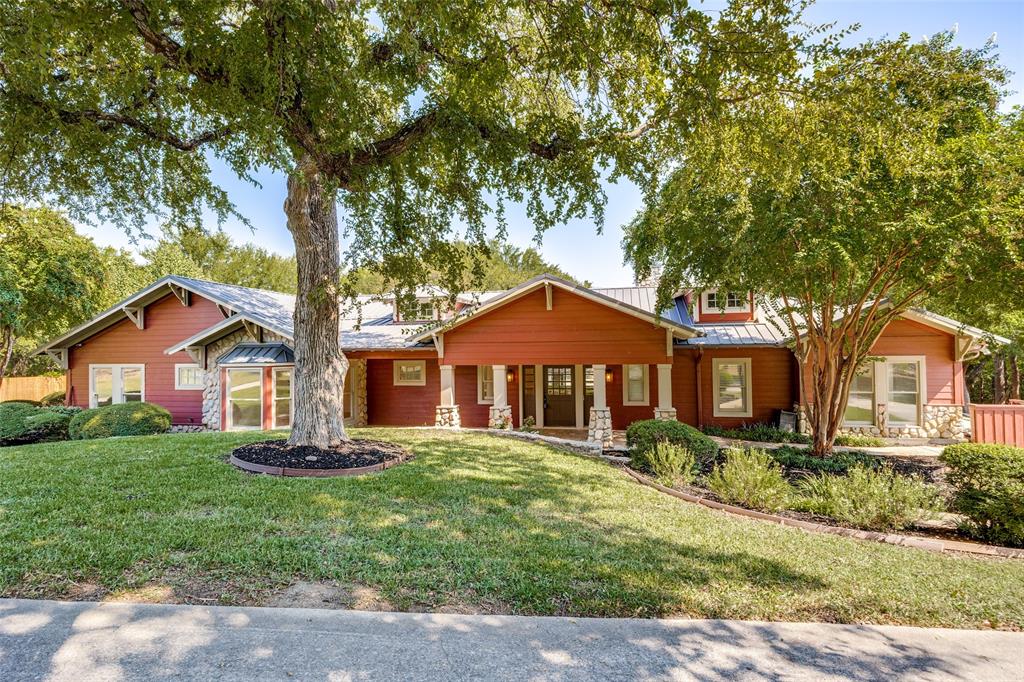 Spanning 4,188 sq. ft. on 8.95 acres, this stunning home offers 4 bedrooms and 3.2 baths. Inside, the family room showcases soaring cedar beams and a striking stone fireplace. The kitchen is filled with natural light from a towering skylight and a wall of windows overlooking the sparkling pool. The large formal dining room includes custom cabinetry and a charming window seating area, making it versatile enough to serve as a sunroom. The primary suite is a true retreat with its own fireplace, custom wood seating area, and access to a private sunroom. The fully renovated primary bath features sleek modern fixtures and sliding doors. Secondary bedrooms are generously sized, each with a built-in desk and dresser, while the Jack-and-Jill bath boasts dual shower stalls. The third bedroom includes a newly updated en suite bath. A spacious game room features extensive built-ins. The mud room includes a utility sink, built in cubbies and the utility room provides abundant storage and space for double washers and dryers. the utility room is also a SAFE ROOM. Step outside to an entertainer’s dream—an expansive lighted pavilion with multiple seating areas, each enhanced by a fireplace or fire pit. The fully equipped outdoor kitchen makes gatherings a breeze, perfectly situated near the sport court. A freshly paved travertine patio and walkway lead to the dazzling pool. There is a workshop on the property with 2 garage spaces. The main house has a 3 car garage and a 3 car carport. Adding even more versatility, the 1,052 sq. ft. guest house offers new flooring, a full kitchen, large bedroom with walk-in closet, and full bath. Kitchen and Bedroom doors open to the back patio with tranquil views of streams, waterfalls, a gazebo, and a pond. The entire property is framed by majestic trees.