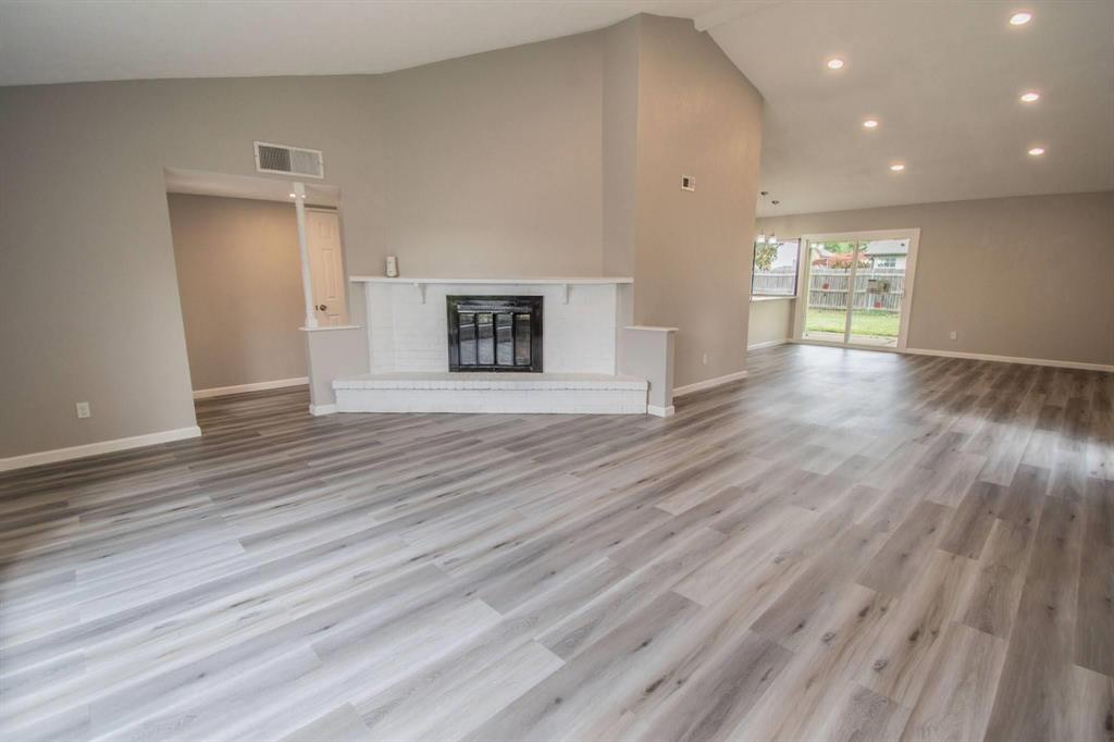 Beautiful single-story home in a mature Bedford neighborhood within HEB ISD, walking distance to Trinity High School and minutes from DFW Airport, shopping, dining, and entertainment. Features an open floor plan with new flooring throughout, fresh interior and exterior paint, and new interior & exterior doors. Remodeled kitchen includes granite countertops, modern backsplash, new appliances, and updated cabinetry. Both bathrooms fully renovated with sleek finishes. Foundation repairs completed with transferable warranty. Large backyard ideal for entertaining, kids, or pets. Refrigerator and dining table negotiable. Area shows strong appreciation with nearby new construction. Priced below market—new homes across the street start in the $600Ks with smaller yards. Seller offering $20,000 toward buyer closing costs. Two-car attached garage with no interior access door to home. Schedule your showing today.