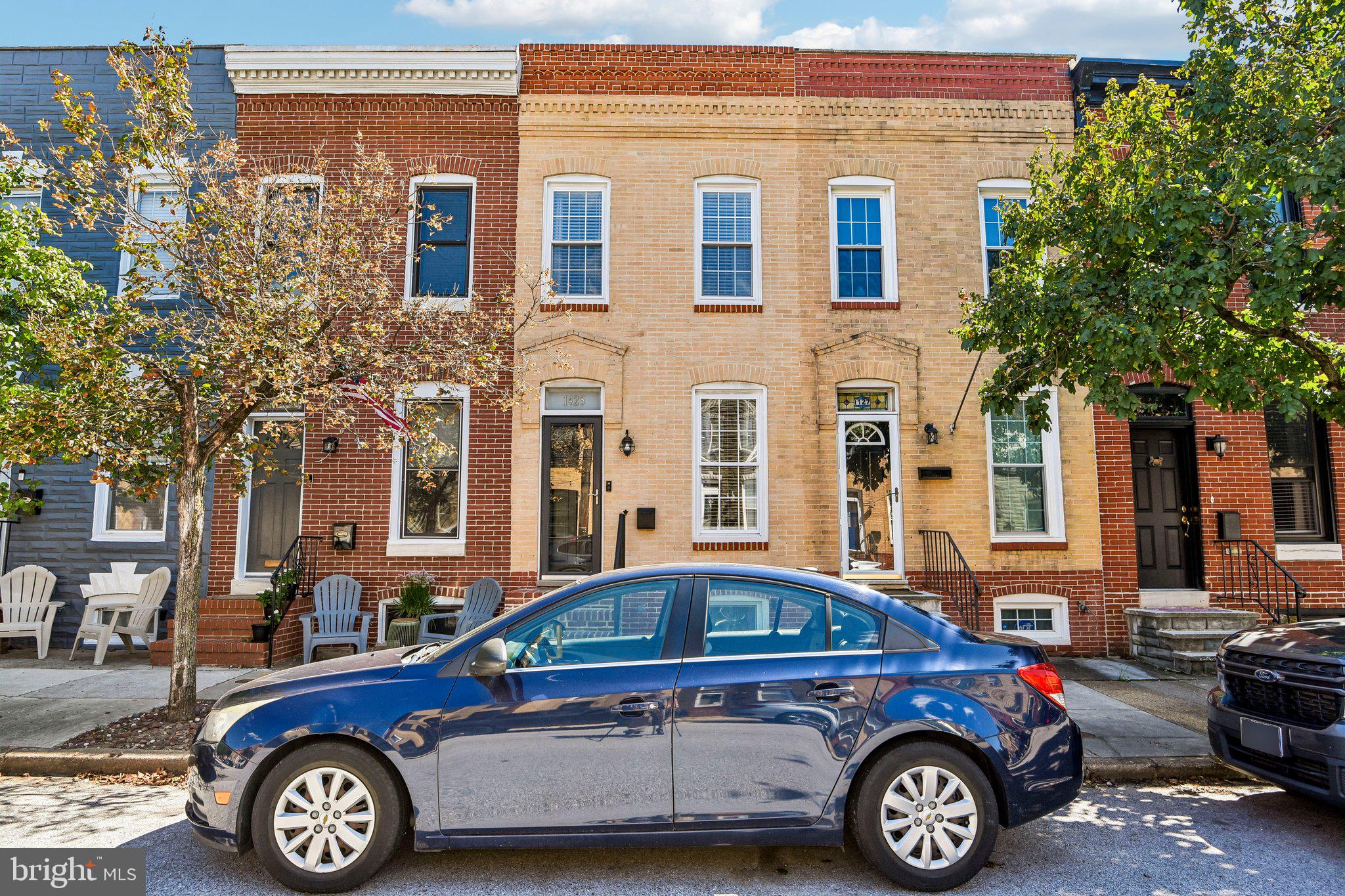 Located in desirable Locust Point, this updated brick rowhome features gleaming hardwood floors, a spacious living room with built-ins, and an updated kitchen with quartz countertops and stainless steel appliances. The main level also offers a separate dining area, while the upper level includes two bedrooms and a full bath. The finished lower level provides flexible space for a third bedroom, family room, home office, or recreation area. Enjoy a private, fenced rear yard, all conveniently located near parks, Fort McHenry, local restaurants, shops, and major commuter routes.  Landlord is open to 6-12 month leases.