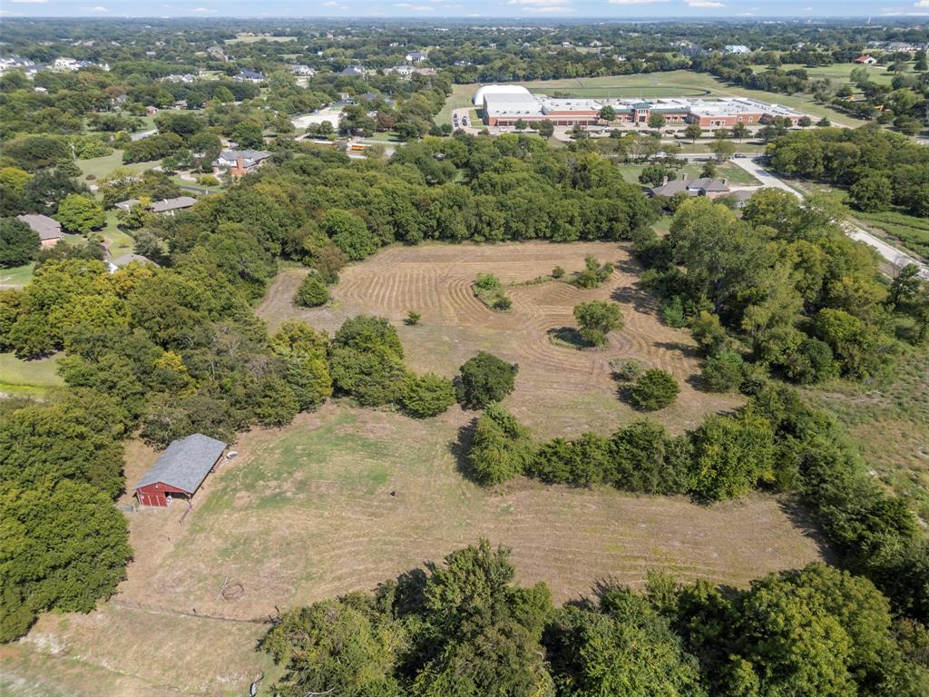 Available!!! Seize this rare opportunity to purchase a property that has not been available for over 30 years! Tucked away at the end of a cul-de-sac street in the heart of Fairview, this nearly six-acre estate property offers the tranquility of a slower-paced life, privacy, strong investment potential, and numerous opportunities for recreation and income generation. It is uncommon to find a retreat from city life while still enjoying the proximity and convenience of nearby shopping and transportation.

Without the restrictions of a homeowner's association and with fewer building regulations, the owner has tremendous flexibility in land use. Options include constructing a custom estate home, renting out the existing home, keeping horses and or livestock, while maintaining the current Agriculture Tax Exemption deduction (note: reapplication is necessary as it does not convey automatically). This residential lot is surrounded by many estate properties and communities, enhancing its appeal.

As land in this high-growth area becomes scarcer, the potential for this property to appreciate makes it a sound long-term investment.

### Location and Features:
- Close proximity to city conveniences such as restaurants and shopping.
- Located within the highly-rated Lovejoy Independent School District.
- The land's natural beauty is highlighted by rolling hills and wooded areas.
- A creek on the property provides an ideal site for a bridge to access a secluded estate building site (a culvert is already in place).

Don't miss this unique chance to secure a piece of serene, yet conveniently located property that promises both lifestyle benefits and potential investment rewards.

This property is occupied and the majority of the land lies to the East of the home.