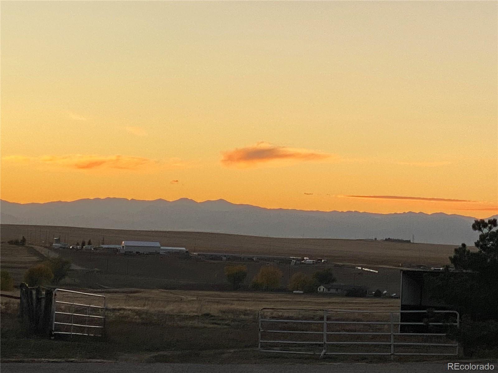 Wonderful Front Range Mtn Views, Ranch Style Home *Amazing Equestrian Ranch* Top Of The Line INDOOR Arena 75x125 Plus Barn* Property can accommodate 75 Horses* was used for Cutting Horses *14 Multi Purpose Structures* Enclosed Hay & Sawdust Storage, Barn has 2 Bedroom Apartment, Free Standing Studio Bunk House, FULL Circle Outside Ring 250 radius, 10 Runs (12x36) Attached to South Side of Arena, 20 stalls Inside Area, 4 Paddocks with Lean-To Shelters & Heated Water *House has Hot Water Baseboard Heat, Bsmt Office could be Wine Cellar, Plenty of Storage, TWO Sunrooms,  Attached 2 Car Garage* Detached Oversized 3 Car Garage* All 38 ACRES are Fenced, 4 Horse/Cow Pastures, Large Pasture Fence Allows You To Divide In TWO Pastures*Pond at North West Corner is Seasonal* Live Work *Close To DIA, Denver and Strasburg* Enjoy the benefits of Watkins Growth* PAVED ROADS From I-70* Much Much More Contact Me Today For More Info and to Make It Your Home 35878 E Mississippi Av