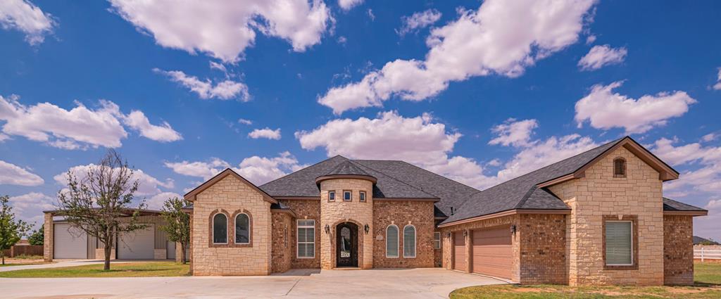 THIS NEIGHBORHOOD HAS PLENTY OF WATER.  21 GALLONS PER MINUTE , 1260 GALLONS PER HOUR. COME SEE THIS ABSOLUTELY STUNNING 4 BED/4.5 BATH/4 LIVING(great room,game room,study,huge upstairs loft)/2 DINING/3 CAR GARAGE HOME WITH 2 WORKSHOPS (2400 SQ FOOT SHOP WITH ELECTRICITY) ON 1.8 ACRES IN FABULOUS GATED COMMUNITY! SPECTACULAR SOARING CEILINGS W/INTRICATE DESIGNS & SPECIALTY LIGHTING! TILE FLOORING & GRANITE THRU-OUT. GORGEOUS GOURMET KITCHEN W/5 BURNER GAS COOKTOP, SUB-ZERO FRIDGE/FREEZER AND DOUBLE OVENS. GORGEOUS POOL AND HOT TUB WITH PLENTY OF AREA TO ENTERTAIN. CALL TO SEE TODAY