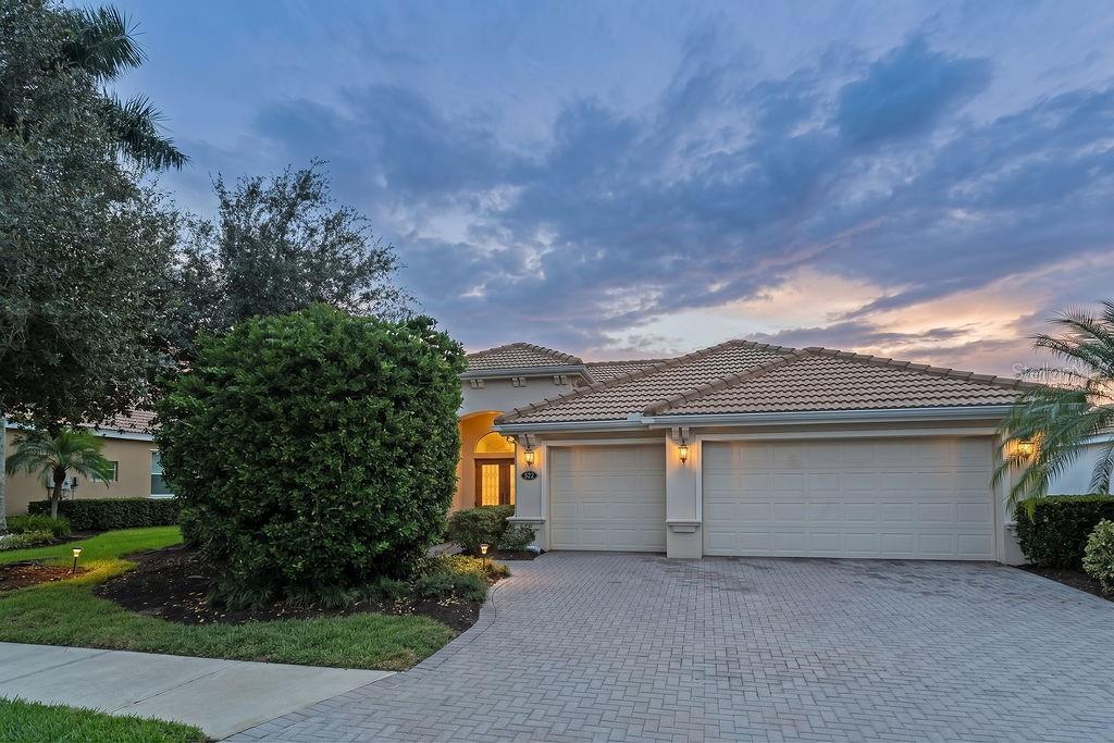 This beautiful Bradenton home offers a spacious and comfortable layout with 4 bedrooms, 3 bathrooms, and a large 3-car garage, making it an excellent choice for families or buyers looking for plenty of room. The home features an open-concept living area with high ceilings, a large kitchen with abundant wood cabinetry, granite countertops, breakfast bar, and ample storage. The spacious primary suite includes a large bedroom and an impressive en-suite bathroom with dual vanities, soaking tub, and separate walk-in shower. Additional bedrooms provide flexibility for family, guests, or a home office. Large windows and sliding glass doors bring in plenty of natural light, while the covered outdoor area and private backyard offer additional space for relaxing or entertaining. Located in a desirable Bradenton community, this property combines space, functionality, and a comfortable Florida lifestyle.