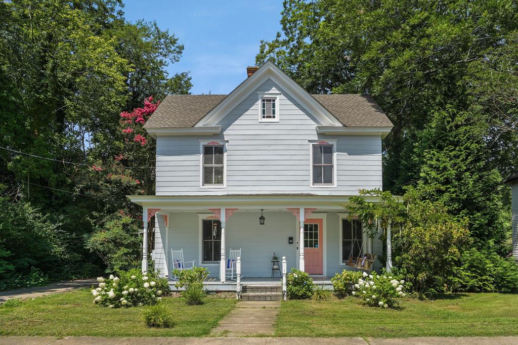 Enjoy living in the historic waterfront town of Onancock, Virginia with a deep water creek & public marina, multiple shops, galleries & restaurants.  Sidewalks along the tree lined streets lead you to infinite cultural amenities:  a local play house, movie theatre, & museum, each hosting public events & concerts regularly.  This spacious & modernized 3 bedroom/ 2 bathroom Victorian home is in the center of town & provides space,  privacy & convenience.  A paved driveway leads to the back screened porch directly off the kitchen & the fenced in back yard.  A charming outdoor shed anchors the back of the property.  Whether you need a potting shed, a workshop, an art studio or a place to store your golf cart, the separate space lends itself to your special projects or extra storage. Come see!