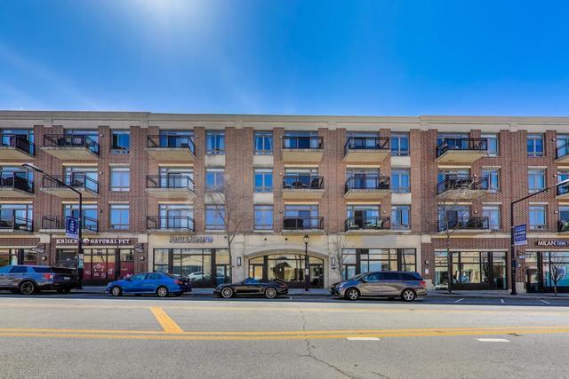 DONT MISS OUT ON THIS SPACIOUS UPTOWN TOP FLOOR LOFT UNIT IN MOVE-IN READY CONDITION THAT IS OFFERING A PERFECT BLEND OF STYLE AND MODERN LIVING.  THE SPACE FEATURES 2 BEDROOMS PLUS A DEN, 2 BALCONIES, A GAS START FIREPLACE, STAINLESS STEEL APPLIANCES AND A VERY LARGE ISLAND WITH GRANITE COUNTER TOPS. THERE IS A LARGE IN UNIT LAUNDRY ROOM AND 2 GARAGE SPACES (TANDEM).  THIS ELEVATOR BUILDING WITH A HEATED GARAGE AND STORAGE UNIT IS LOCATED IN DOWNTOWN PARK RIDGE WALKING DISTANCE TO THE METRA, RESTAURANTS, BARS, AND ALL UPTOWN PARK RIDGE HAS TO OFFER. NO EXEMPTIONS ON TAXES. UNIT CAN BE RENTED OUT.