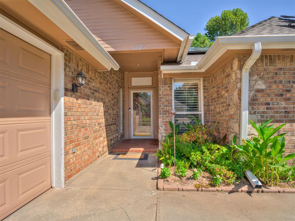 Welcome to this beautifully maintained 3-bedroom, 2-bathroom home with a dedicated office that’s perfect for working from home or quiet study. Inside, you’ll love the spacious and flexible floor plan featuring warm wood-look flooring, fresh paint, and plenty of natural light streaming through plantation shutters. The inviting living room is anchored by a gorgeous stone fireplace surrounded by custom woodwork, creating a cozy space to gather. The kitchen offers abundant cabinet storage, a center island, breakfast bar, and stainless-steel appliances, all opening to the dining area for easy entertaining. The private primary suite provides a relaxing retreat with its generous layout and en suite bath, while two additional bedrooms are equally spacious. Outside, enjoy the large covered patio and pergola overlooking the fenced backyard that is perfect for summer barbecues or quiet evenings at home. Additional highlights include an oversized driveway, 2-car garage, and energy-saving solar panels. This home truly blends comfort, charm, and modern convenience. Schedule your private showing today!
