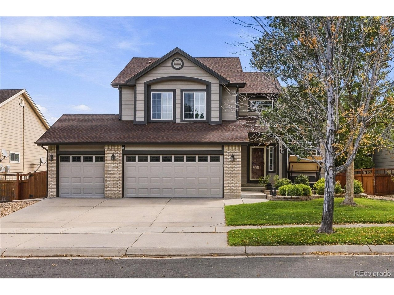 Welcome to this beautifully updated, move-in-ready home in the welcoming Brighton Crossings community, where an abundance of amenities create an exceptional lifestyle. Brighton Crossings offers an impressive array of amenities, including pools, pickleball & tennis courts, gyms, dog parks, open space, and Frisbee Disc Golf Course. The Venture Center frequently hosts holiday events and community clubs. Walk to the Venture Center and enjoy being less than a half-mile from the Brighton Crossing Fitness Center, dog park & open space. Extensively updated with a new roof, interior & exterior paint, gutters, carpet, LVP flooring, appliances, windows, kitchen & bath remodels, water heater, hot tub, and garage door controls. The newer high-efficiency furnace, gas heat, 220V electrical, attic insulation, and basement-wired server network add comfort and functionality. The fully finished, insulated & heated 3-car garage features abundant outlets-perfect for projects, hobbies, and extra storage. This light-filled home features a functional open layout with both formal & informal living spaces, 2-story ceilings, & plenty of room to gather and entertain. The remodeled chef's kitchen shines with abundant white cabinetry, a 5-burner gas range, fingerprint-resistant GE appliances, and generous workspace. The family room features a cozy fireplace surrounded by built-ins, creating the perfect place to relax. Four spacious upper-level bedrooms provide room for everyone, while the finished basement offers additional living space. Step outside to an oversized, private backyard designed for enjoyment. A large deck with built-in lighting overlooks the spacious yard and incredible hot tub, which creates a relaxing nighttime retreat. A storage shed adds convenience, while the pretty nighttime lighting enhances the outdoor ambiance. Welcome home!