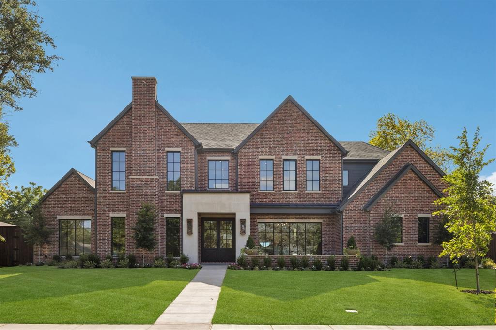 Luxury defined by Draper Custom Homes, this exceptional new-construction estate in coveted Walnut Hill Manor offers 6,705 sq ft of thoughtfully designed living space on an expansive 0.374-acre lot. A timeless brick and cast stone exterior sets the tone for an interior defined by natural light and refined materials.Designed for everyday living and entertaining, the main level features a private primary suite with a spa-inspired bath, dual vanities, and an oversized walk-in closet, along with a separate guest suite ideal for guests or multigenerational living.The family room opens to a covered patio and large backyard. The chef’s kitchen pairs Thermador appliances with a large island, custom cabinetry, dedicated scullery, and walk-in pantry, while an elegantly-designed bar connects to the dining room for easy entertaining. White oak flooring, Visual Comfort lighting, and Thibaut wallpaper bring warmth and sophistication throughout, with selections thoughtfully curated with timeline design in mind. Every space has been considered—from the dedicated office and organized mudroom to the drop zone and extensive storage designed for a busy family. Two laundry rooms add convenience. A three-car garage and fire sprinkler system provide function and peace of mind.Upstairs, three additional bedrooms feature ensuite baths, joined by a game room and flex space ideal for recreation, exercise, crafts, multigenerational living, or storage. An elevator shaft provides for a future elevator, while a second-floor laundry, powder bath, and walk-in storage complete the level.The covered patio features an outdoor kitchen and fireplace overlooking a backyard with room for a future pool. Centrally located near private schools, premier shopping and dining, as well as Midway Hollow, and Preston Hollow, this timeless Draper Custom Homes residence offers exceptional craftsmanship, thoughtful design, and a rare scale of both home and lot.