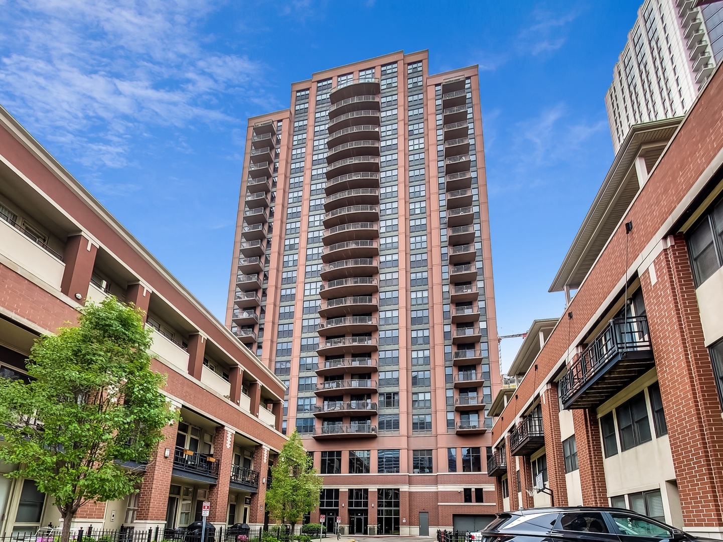 This thoughtfully redesigned east-facing 1BD|1 BA includes a separate den/office space, perfect for those who work from home, and a just completed bathroom remodel with quartz and luxurious shower! This ready to move in has been freshly painted condo offers a fantastic open layout with wide-plank laminate flooring throughout, marble entryway with a built-in wet bar, open kitchen with stainless steel appliances and an extended granite counter for seating. The spacious living room offers plenty of space for a dining area and seamlessly connects to the dedicated office through french doors. The stunning upgraded bathroom features a luxurious walk-in shower with frameless glass shower door, modern tile, quartz vanity, and designer fixtures. Enjoy your large private balcony with stunning city views and in-unit washer/dryer!  Monthly HOA includes is inclusive of all utilities besides electric. Enjoy Kinzie Station offers a variety of amenities including 24-hour door staff, fully-equipped fitness center, dry cleaners, party room, Amazon Hub, pet-friendly turf area, landscaped terrace, and individual EV charging capability - all while being just steps from award-winning restaurants, cafes, nightlife along Fulton Market and Randolph Row, East Bank Club, Soho House, Chicago Riverwalk, parks (including dog parks), Metra/CTA (Green, Pink, Blue lines), and easy expressway access. Grocery shopping is a breeze with Jewel-Osco just across the street and Whole Foods and Mariano's nearby. Deeded garage parking & storage locker are included in the price!