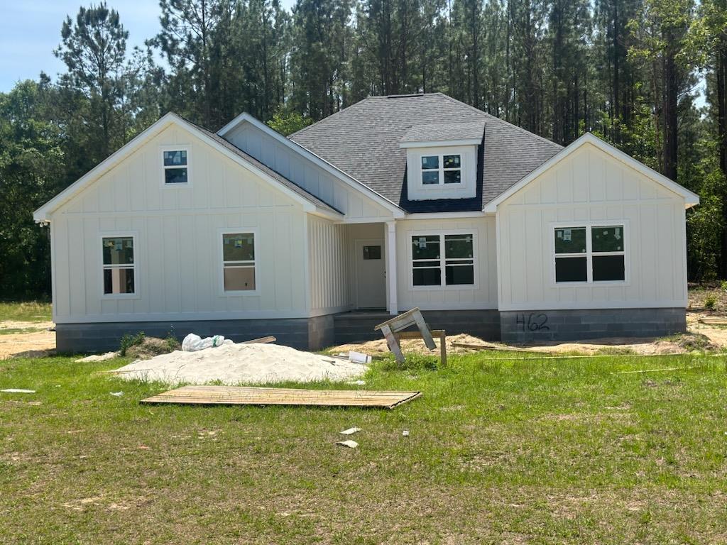 New construction homes featuring custom finishes in a great Cairo, Georgia subdivision. Conveniently located near Thomasville, Bainbridge, and Tallahassee. Three homes sit on 3-acre tracks, with two additional homes on a 1.5-acre tract. Covered patios and thoughtfully designed layouts offer modern living with plenty of space. Primary  bathroom includes a large tile shower and double vanities. Luxury Vinyl Plank (LVP) flooring runs throughout the home for durability and style. The kitchen showcases an abundance of cabinets, a kitchen bar, and granite countertops. Outdoor spaces include covered patios for comfortable outdoor living.