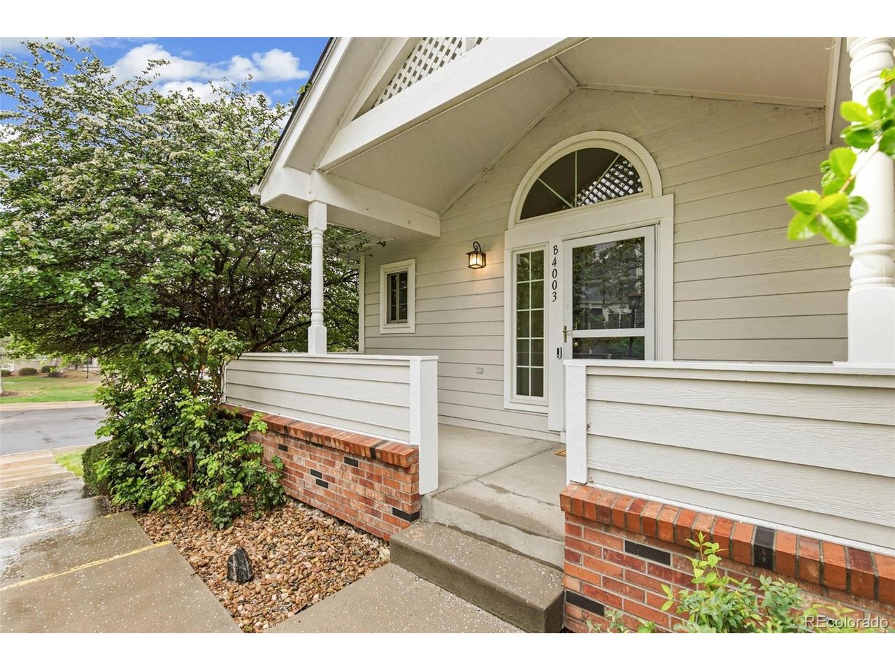 This light-filled, spacious 2 story condo in the Estates at Meadow Hills is just steps away from Meadow Hills Golf Course and Carson Park, and minutes away from Cherry Creek State Park and Quincy Reservoir.  Outdoor enthusiasts will enjoy this convenient location. Great curb appeal on this unique 4-plex condo, with a large, welcoming covered porch flanked by flowering shade trees.  Upon entry, you'll appreciate the open floorplan with a bright and airy feel, and abundant natural light.  The living space features a cozy fireplace with built-ins.  The spacious kitchen with neutral light-toned wood cabinets features granite countertops, stainless steel appliances, including Bosch Dishwasher, LG stainless steel refrigerator with ice maker, Maytag range and microwave, and two pantries.  Adjacent to the kitchen, a versatile bonus space offers the perfect spot for a large dining area, additional living room, or even the potential to convert into a bedroom or office. A powder bath on the main floor offers convenience. This well-designed floor plan presents ample space for entertaining and allows everyone in the household to enjoy their own distinct areas. Upstairs, the large primary en-suite bedroom with vaulted ceiling and beautiful arched window gives you space to retreat, with two additional bedrooms sharing a second upstairs bath. Major updates include: roof replaced and new gutter guards (2023), exterior paint (2021), windows were replaced a few years ago, hot water heater is also not original, giving buyers peace of mind that these big-ticket items have been addressed. Additional upgrades include a whole house fan, very nice honeycomb blinds for energy efficiency and privacy, Vivant Security system.Storage is abundant, with additional storage areas in the attached 2 car garage. There are 2 parking spaces available for guests in each 4-unit building, as well as street-parking. Cherry Creek Schools.