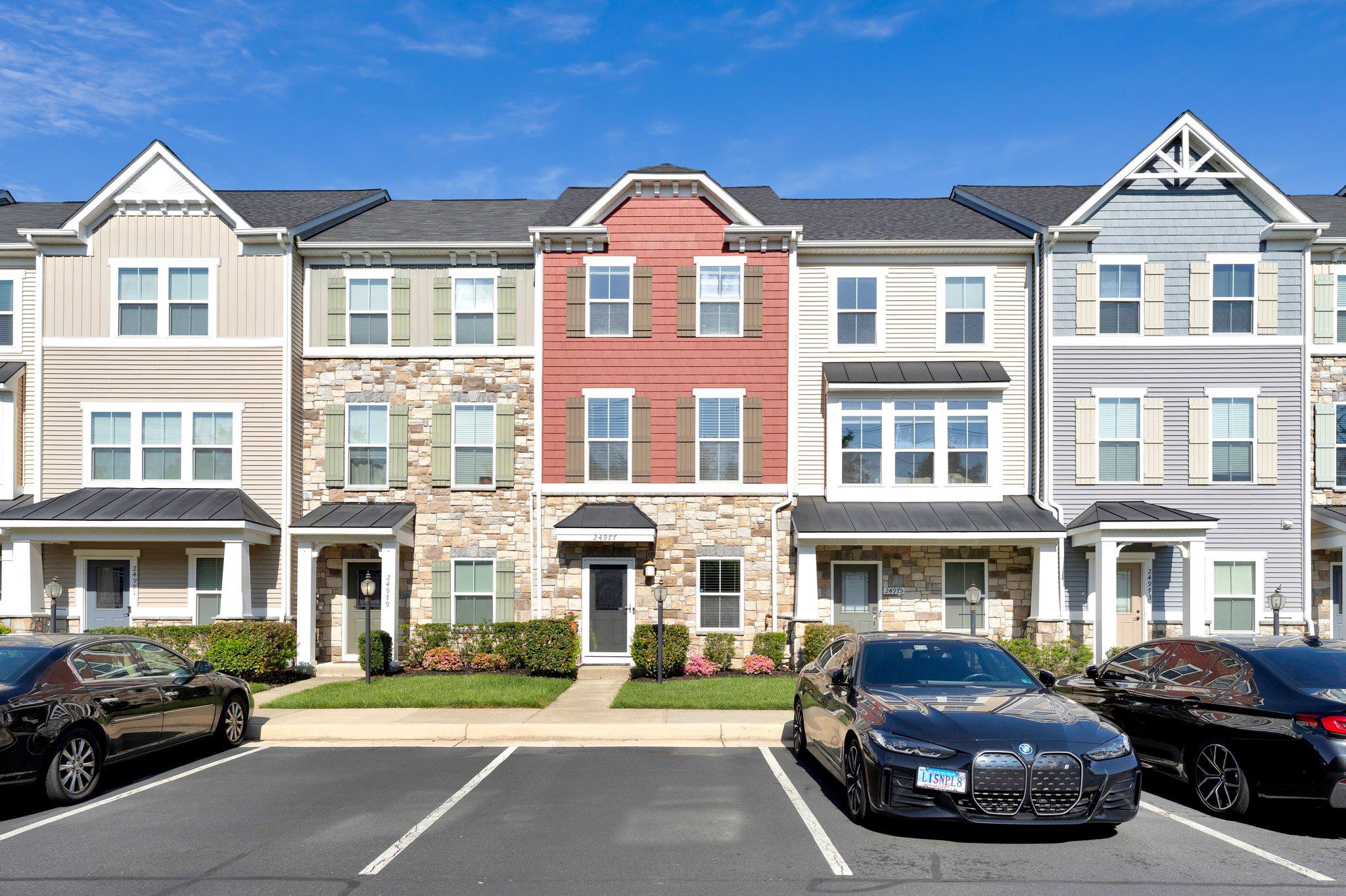 Tucked into Aldie's Westridge neighborhood, this three-level townhome delivers the kind of layout that works for your life - whether you're hosting friends, working from home, or setting up for multi-generational living.Each of the three bedrooms comes with its own private full bath, a rarity that sidesteps the usual morning scrambles. Updates include freshly painted kitchen cabinets and walls throughout, brand new carpeting on the upper level, and a standout newly built deck. Hardwood floors, high ceilings, and an open floor plan on the main level keep things feeling airy and connected - the kind of space where a dinner party flows naturally from the granite-topped kitchen and breakfast bar out to the back deck.The entry level offers flexibility: a private ensuite bedroom that works equally well as a dedicated home office, a creative studio, or comfortable quarters for visiting family. A large one-car garage rounds out the lower level with room for both parking and storage.Upstairs, the primary suite is spacious and well equipped - two closets and a double-sink bathroom. A second ensuite bedroom and a full-size stacked laundry complete the upper floor.The Westridge community provides two clubhouses that anchor a roster of amenities: multiple pools, well-equipped fitness centers, tennis and basketball courts, a dedicated dog park, and more than a dozen playgrounds. Miles of walking and biking trails wind past ponds and natural green space - perfect for evening walks and weekend bike rides. The community calendar keeps things social year-round, with food truck nights, poolside gatherings, and wine tastings.Zoned for highly regarded Loudoun County schools, and positioned minutes from commuter routes and plentiful dining and shopping, this is a home that offers modern convenience and a community feel - welcome home! New carpet (2026), Updated cabinets (2026), New decking (2026)