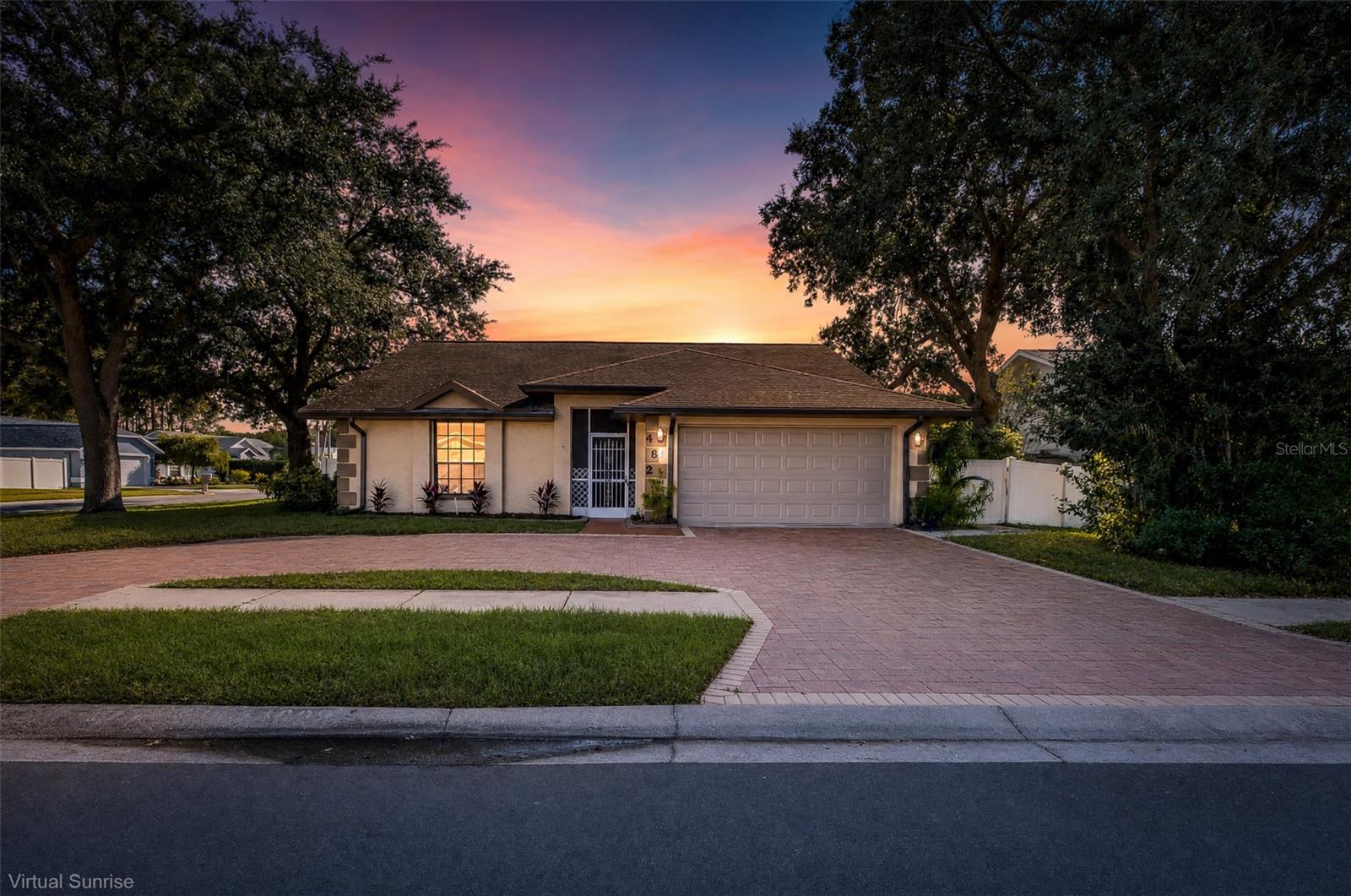 BEAUTIFUL 3/2/2 POOL HOME ON A FENCED CORNER LOT WITH CIRCULAR DRIVEWAY!  OPEN AND BRIGHT WITH VAULTED CEILINGS, PLANT SHELVES AND NEWER LAMINATE FLOORING.  GREAT SIZE KITCHEN FOR THE CHEF IN THE FAMILY AND PLENTY OF CABINETS.  LIVING ROOM WITH L SHAPE DINING ROOM IS PERFECT FOR ENTERTAINING.  SPLIT BEDROOM PLAN AND PRIMARY BEDROOM WITH DOUBLE CLOSETS AND ENSUITE BATH, DUAL SINKS AND GRANITE TOP WITH THE PERFECT GARDEN TUB TO RELAX AFTER A BUSY DAY. NICE SIZE POOL WITH PEBBLE TECH FINISH OFF THE COVERED LANAI AND A PRIVACY FENCED BACKYARD. HURRICANE SHUTTERS. LOCATED WITHIN MINUTES TO SHOPPING, RESTAURANTS AND SHORT DRIVE TO THE SUNCOAST PARKWAY.  HOT WATER HEATER 2026, AC 2014.  THIS IS A MUST SEE TODAY.