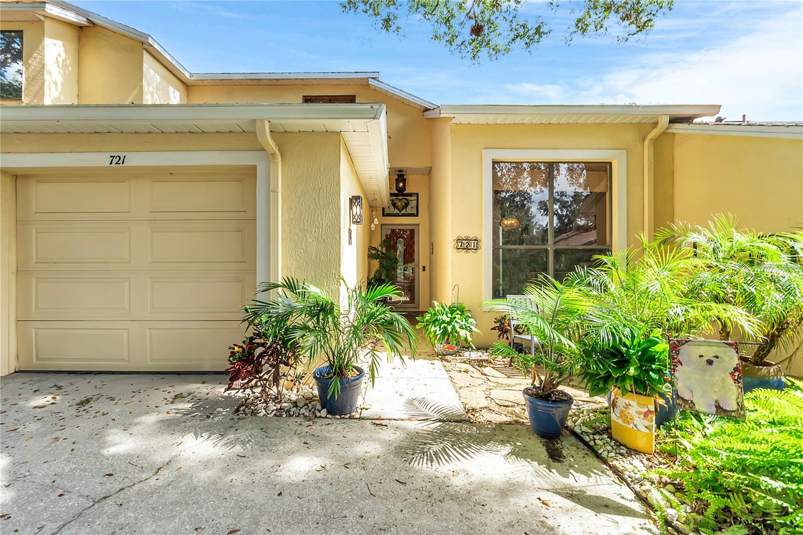 Welcome to 721 Swan Lane!  Enjoy easy, low-maintenance living in the gated community of Cranes Roost Villas in Altamonte Springs. This 3-bedroom, 2.5-bath townhome offers an open floor plan with an updated modern kitchen, stainless steel appliances, and plenty of counter and cabinet space. The kitchen is open to the living and dining areas which feature high ceilings and sliding doors leading to a screened-in patio—perfect for relaxing with your morning coffee and enjoying the weather all year round.  An additional half bath and interior laundry room are also located on the first floor.  The first-floor spacious primary suite includes a walk in closet and private en-suite bath, while two additional bedrooms and a full bath are upstairs.  Community amenities include a pool, tennis courts, and 24/7 gated security, all with a low monthly HOA.  Ideally located just minutes from I-4, top-rated Seminole County schools, shopping, dining, Cranes Roost Park, and more. Major updates include a replumb in 2023, new water heater (2023), and AC (2016). Schedule your tour today and make this beautiful townhome your new home!