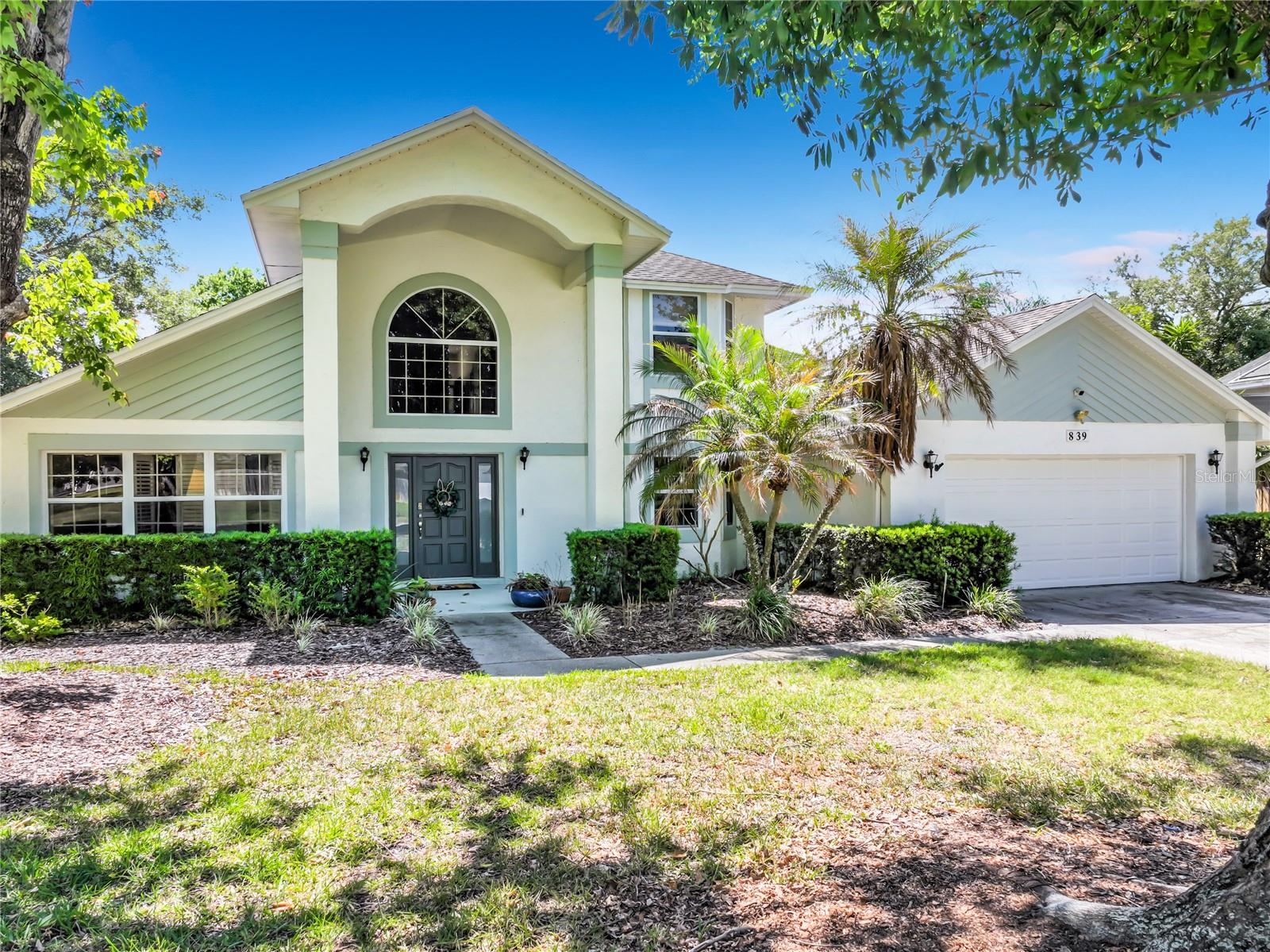 This spacious two-story residence perfectly balances the serenity of a large, private lot with sleek, modern upgrades. The open-concept floor plan is anchored by brand-new tile flooring (2024) that flows seamlessly through the main living areas. Designed for privacy, the Primary Suite is located downstairs, offering a quiet retreat from the secondary bedrooms. The heart of the home is the refreshed kitchen, featuring sleek quartz countertops and newer appliances, creating a stylish and functional hub for entertaining. Transition effortlessly from the indoors to your private backyard sanctuary, where a sparkling pool and meticulously curated gardens create a "summer vacation" atmosphere year-round. For the tech-savvy and storm-conscious homeowner, the garage is fully equipped with a Level 2 EV fast charger and a generator transfer switch for seamless power backup. Finished with a fresh coat of exterior paint (2024), this home is truly turn-key. Unbeatable Location: Enjoy convenient access to FL-408 and FL-417, placing Downtown Orlando and the International Airport just a short drive away. Proximity to UCF, Valencia College, and Waterford Lakes Town Center ensures the best in education, shopping, and dining is right at your doorstep.