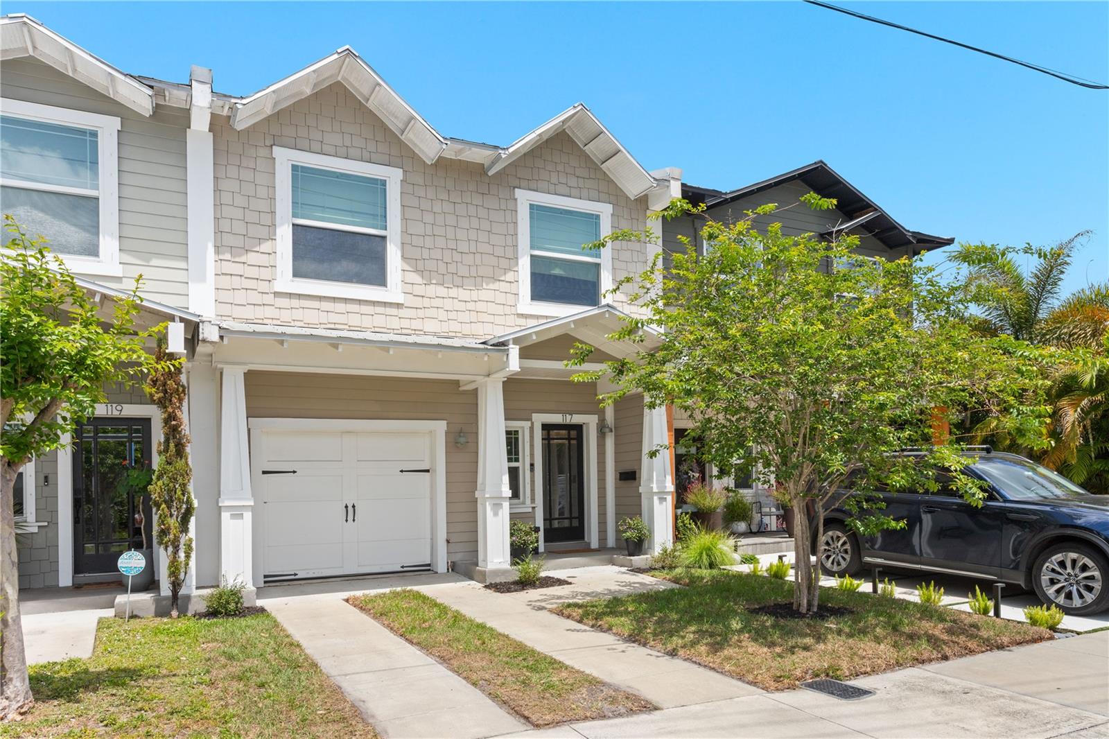 This 3 Bedroom, 2.5 Bathroom townhome is situated on a quiet side street in the heart of vibrant Seminole Heights. There is abundant natural light throughout the home, which also has many architectural details such as crown molding, engineered bamboo flooring throughout, and a Versailles pattern wood staircase. The first floor has an open floor plan with a spacious living room and dining room and beautiful kitchen with statement pendants, butcher block counters and an island with breakfast bar seating. A guest powder bath and storage closet are also found on the first floor. Upstairs, the primary bedroom has a large walk-in closet and en-suite bathroom with oversized tile shower and double vanity. Two large secondary bedrooms share a full bathroom. Laundry is also conveniently located on the second floor. A private, fenced backyard area has a turf yard perfect for play or pets. This home is just a short stroll to The Heights’ many restaurants and shops, as well as close proximity to downtown Tampa.