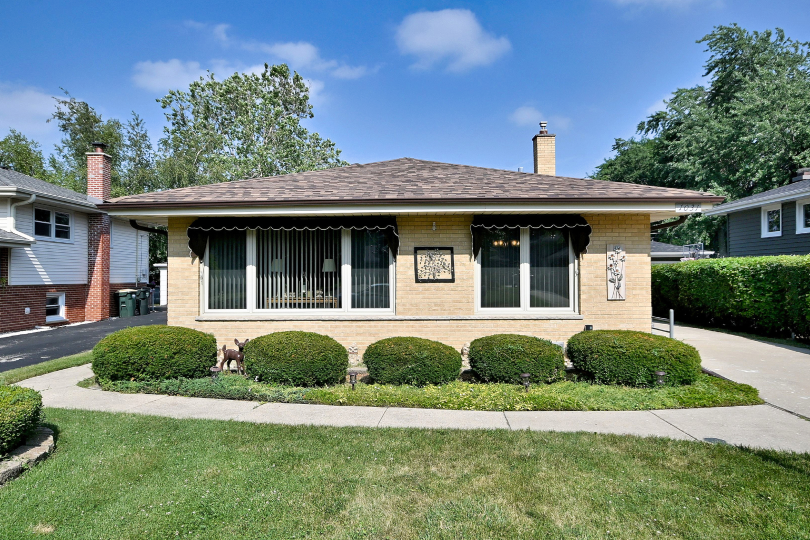 Welcome home to this cozy and charming spacious split level with sub-basement! Extremely clean and well maintained. Beautiful hardwood floors flow through the main living areas and bedrooms, creating a warm and inviting atmosphere. Updated eat-in-kitchen, Corian countertops, and white appliances. The spacious primary bedroom accesses the Jack and Jill bathroom and includes a double closet. Generous closet space throughout the home provides plenty of storage. Relax in the lower-level family room, complete with a cozy fireplace and enjoy the finished sub-basement with a recreation room that can also serve as a home office or a play area. Recent improvements include a new sump pump with battery backup, new water heater, two-year-old tear off roof on the house and garage, newer windows and newer a/c and furnace. Sewer pipes have been recently professionally rodded. Lower-level spacious laundry area with direct access to the backyard. Large concrete side-drive leads to a two-car garage, a spacious patio and more grass area for your gardening ideas. Located within walking distance to parks and the beautiful downtown Arlington Heights dining, shopping, Metra and library, this well-maintained home is ready for its next owners!