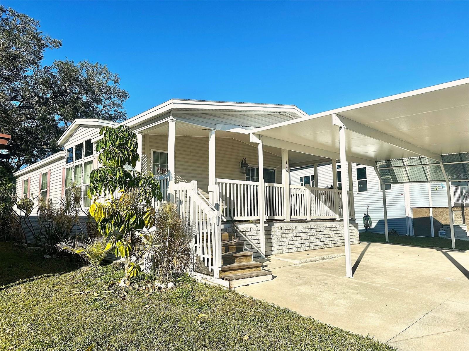 Hurry to see this Resort Inspired 2015 Luxury Model, 3 bedroom, 2 bath Model Home, with all the extras! Upgraded Tiered Living Area Ceiling, with rounded edge Drywall interior!  Cathedral ceilings throughout, with all open living area to enjoy! Inviting fully loaded open kitchen, breakfast bar to enjoy your fun entertaining! Spectacular double door Master Bedroom suite, with spacious walk in closet, over sized master bath, with walk in shower! This home has everything you would want, including the convenient laundry room, and extra storage closet. All new Shingle Roof 2025, Central Air Heat '20, Vinyl Siding, and Covered Parking for 3+ Cars! Including plenty of room also for your golf cart! So many extras to see! Come see the shaded large private back yard, and covered front porch to enjoy your relaxing mornings! This 5 star, 55+, Super Fun & Active Resident Owned Community (See Clearwater Cascade website for pics) is close to shopping, beaches, airports, golf courses, medical, and all you want! Cash Only! Asking $228,500., includes the $55k share! Low $332. mo. fee. Small pet ok!