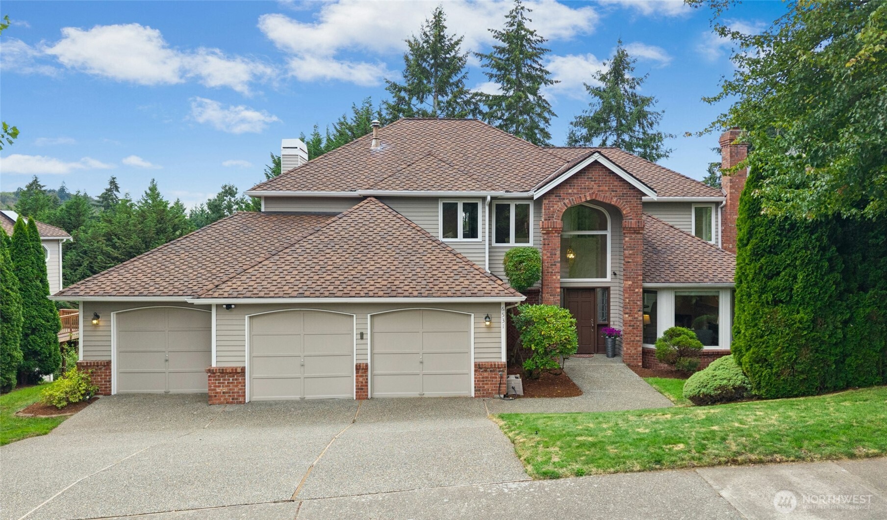 Welcome to this beautifully refreshed 3,420-square-foot home that perfectly blends modern updates with classic comfort. Built in 1992 on a generous 0.22-acre lot, this spacious property features 5 bedrooms and 3.5 bathrooms, including a private bedroom and full bath in the fully finished basement. The home offers incredible peace of mind with a new roof installed in 2018, a new furnace from 2023, and central AC to keep you cool all summer. You will love the extensive 2026 remodel, which showcases fresh interior paint, brand-new carpet on the main level and basement, and fully updated bathrooms featuring stylish new countertops, light fixtures, and flooring.The heart of the home is the bright kitchen, complete with premium granite countertops and a charming bay window. Head outside to relax on the durable Trex deck enjoying Newcastle GC view. The luxurious primary bedroom suite serves as a private retreat, boasting high vaulted ceilings, a 5-piece bathroom, and peaceful views overlooking lush greenery. You will highly value the top-tier education provided by the acclaimed Issaquah School District, with Cougar Ridge Elementary, Cougar Mountain Middle, and Issaquah High School.