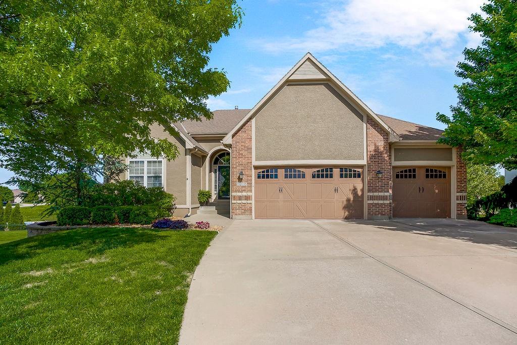 Gorgeous golf course living on Fairway #2 in the highly sought-after Creekmoor community. This reverse 1.5-story offers the kind of everyday escape most people only get on vacation.The open main level is highlighted by a stunning stone fireplace and expansive floor-to-ceiling windows overlooking the course—complete with added tint for comfort and efficiency, or step out to the screened-in deck to enjoy peaceful, private views year-round.The main level primary suite features golf course views, a spa-like bathroom with connected walk-in closet. The second bedroom on the main level is spacious and private with its own bath. Main level laundry completes the simplicity of one level living.The play area downstairs includes space for TV retreat or party central, with the pool table available to stay. It walks out onto an enclosed patio that is perfect for your future hot tub or quiet evenings watching the course.Basement also includes a third bedroom, oversized full bath, and tons of storage This coveted community was designed around Lake Creekmoor, a private 108-acre lake, and Creekmoor Championship Golf Course. The community’s featured amenities include a newly renovated clubhouse offering casual dining where you can take in the picturesque views from the gorgeous covered outdoor patio. The clubhouse also offers a pro shop, 24-hour fitness center, two swimming pools and sport courts.Tucked away on a quiet cul-de-sac, this home blends comfort, privacy, and elevated living in one of Creekmoor’s most desirable locations.