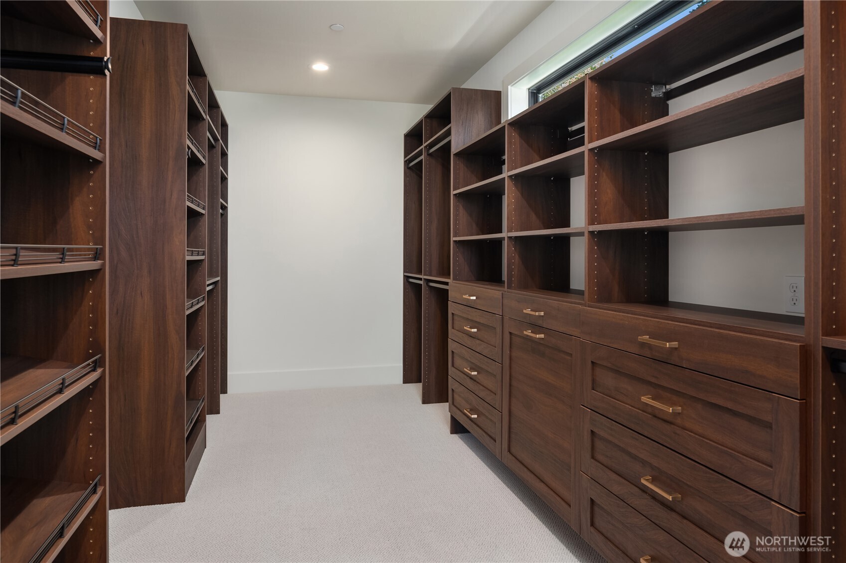 Custom walk-in closet built for an extensive wardrobe