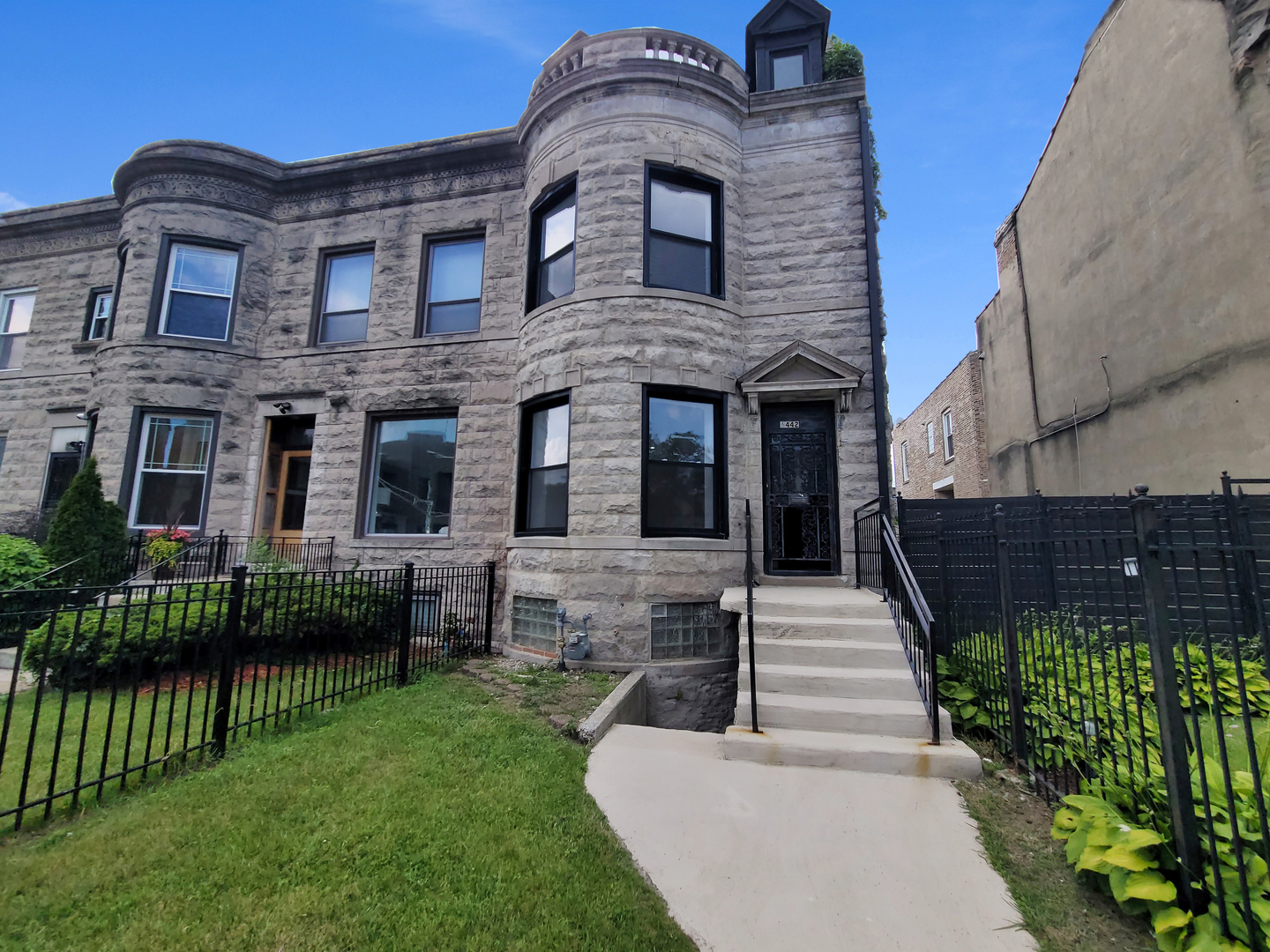 Enter into timeless elegance with this beautifully renovated 3-story Greystone located in the heart of Woodlawn, one of Chicago's most vibrant and rapidly developing neighborhoods.  This spacious home features 4 bedrooms, plus an additional bedroom in the fully finished basement-perfect for guests, extended family or a private home office.  The main level boasts an open-concept living and dining area, soaring ceilings, and refinished hardwood floors throughout.  It is conveniently located near the Obama Presidential Center, University of Chicago, parks, public transit and the lakefront.  Don't miss this one-of-a-kind Woodlawn gem!