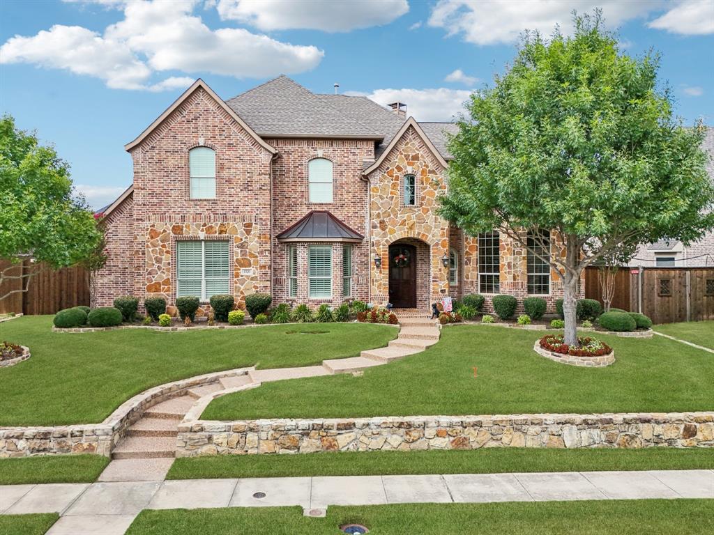 This exceptional home blends timeless elegance with modern comfort, offering over 5,000 sq. ft. of thoughtfully designed living space in one of Frisco’s most desirable neighborhoods. Pre-inspected for peace of mind, it’s ideal for buyers seeking both sophistication and convenience.

The inviting foyer welcomes you with rich hand-scraped hardwoods flowing throughout the main level. A private study with custom cabinetry and French doors creates a refined workspace, while a highly sought-after ensuite bedroom on the first floor offers flexibility for guests or in-laws. At the heart of the home is the gourmet kitchen, designed for the culinary enthusiast with professional-grade appliances, abundant prep space, and seamless flow into the breakfast area and family room. Expansive windows fill the home with natural light and frame serene views of the sparkling pool.

The first-floor primary suite is a true retreat, featuring a spa-inspired bath with soaking tub, oversized shower, and dual walk-in closets. Upstairs, discover a haven for entertaining with a spacious game room, fully equipped media room, and generous secondary bedrooms. A private ensuite guest suite upstairs ensures comfort for visitors.

Outdoor living shines with a covered patio perfect for dining or lounging poolside. The beautifully designed pool enhances both lifestyle and aesthetics, creating a private oasis for gatherings or quiet evenings.

Ideally located just minutes from parks, premier shopping, and fine dining, this home offers unmatched convenience. Families will appreciate the walkability to top-rated schools—Wakeland High, Griffin Middle, and Pink Elementary—rounding out the appeal of this move-in ready Shaddock Creek estate.
