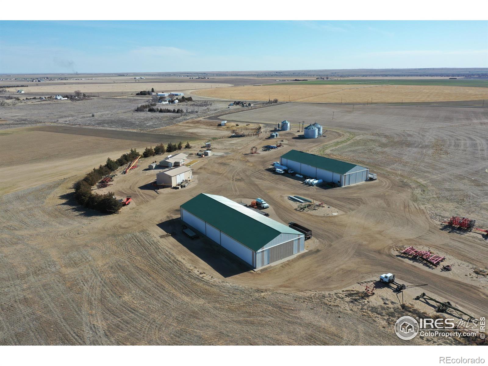 Approximately 480 acres of irrigated ground with 4 pivots. The remainder of the property is made up of 880 +/- acres of dryland and access roads, 250+/- acres of pasture, farmstead with a house, shops, grain storage, and cattle pens (approximately 20 acres). There are 8 wells commingled to supply water to the four pivot sprinklers, and 3 additional permitted, undrilled wells that could irrigate 160 acres around the farmstead. The Shaver Farms property, located in Southwestern Morgan County Colorado, has been operated by the Shaver family for 3 generations. The irrigated crops have shown high yields over the years, crop records are available upon request. This is a profitable farm with very nice amenities, making it easy to get the day's work done and take proper care of the equipment. Too many positives to list, but this farm being profitable should tell you enough, a must see. Call for information and to see the farm.