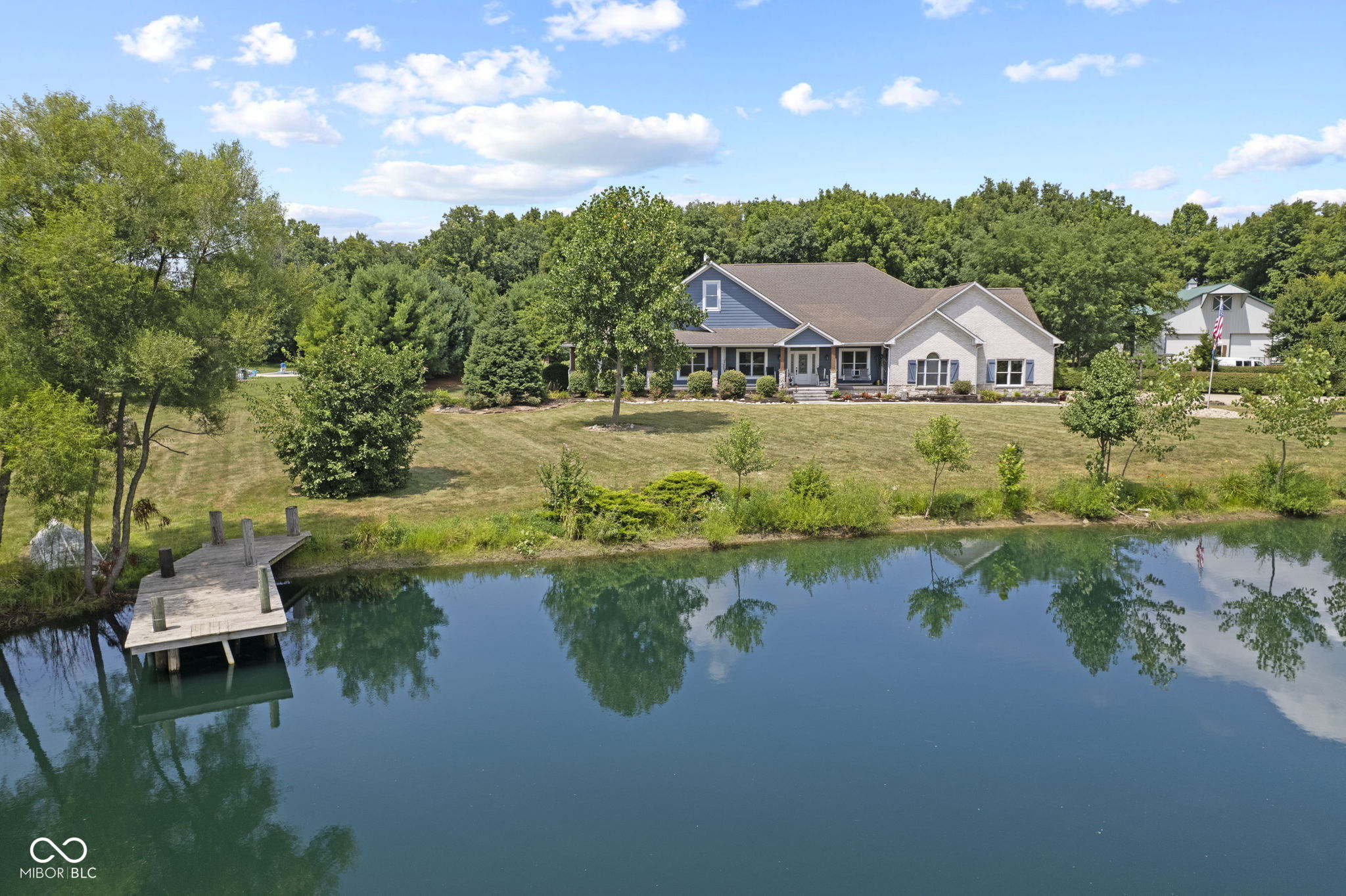 Stunning Sprawling Custom Ranch that is "One of a Kind" Entertainment Paradise!!! OVER 4200 Sq.Ft. Home, 10 Acres w/Woods, 2 acre Stocked Pond, 30X30 PARTY Room, Inground Pool, Hot Tub, 60X65 Pole Barn w/APARTMENT and so MUCH MORE! Chef's Dream Kitchen that offers a HUGE Island with Seating, Built In Refrigerator, Wine Cooler, Beverage Frig, Pot Filler, Commercial Appliances, Eat In area and a Breakfast Bar! Oh Yeah,! Did I mention the Gorgeous Granite Countertops and Cabinets with LOTS of Bells and Whistles? LUXURY at it's Finest by Enjoying the Primary Bathroom Oasis featuring a Jetted tub, Two Person Tiled Shower, Cabinets Galore, Make up desk, Large Custom W/I Closet and Heated Tile Floors!  Classy Office, Formal Dining Rm/Living Room, Br2 & BR3 have a Jack/Jill Bath, Cozy sunken Family Rm w/Stone Fireplace and Built In Bookshelves, Laundry Rm, and Sunroom ALL on ONE Level! * It's Pool Party PARADISE Time* Heated Salt Water Pool, Outside Bar/Kitchen, Exterior Bathroom w/outside Shower, Hot Tub, recessed Firepit, and 16X16 Pavilion w/ Beautiful Travertine Tile! Enjoy the Tranquility of the Private View on the Big Front Porch overlooking the Water with your Morning Coffee! But Wait there's MORE...Above the Garage there is OVER 3000 Sq Ft of Unfinished POTENTIAL with Stairs! There is so much CHARACTER in this Home with the Lavish amount of Tile, Granite, Glass Transoms, and Crown Molding & Detailed   Woodwork, that there's not enough room to mention it all! This one will NOT Disappoint! Please see the Detail Feature List.