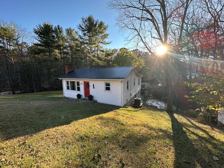 Discover your ideal lake retreat at this charming cabin, complete with its own private dock. Perfectly situated just 0.7 miles from Dehaven Park and its convenient boat ramp, this property is known as Fisherman's Haven—a popular spot for fishing and relaxation. Enjoy peaceful mornings with coffee on the side porch or unwind on the dock overlooking the water. Inside, the living room features large windows that fill the space with natural light and provide beautiful views of the lake. The open-concept kitchen flows seamlessly into the den and living room, creating an inviting space for entertaining family and friends. This move-in-ready home offers 2 bedrooms and 1 bathroom, along with several recent updates including a new roof, new heat pump, and new windows. Schedule your showing today!